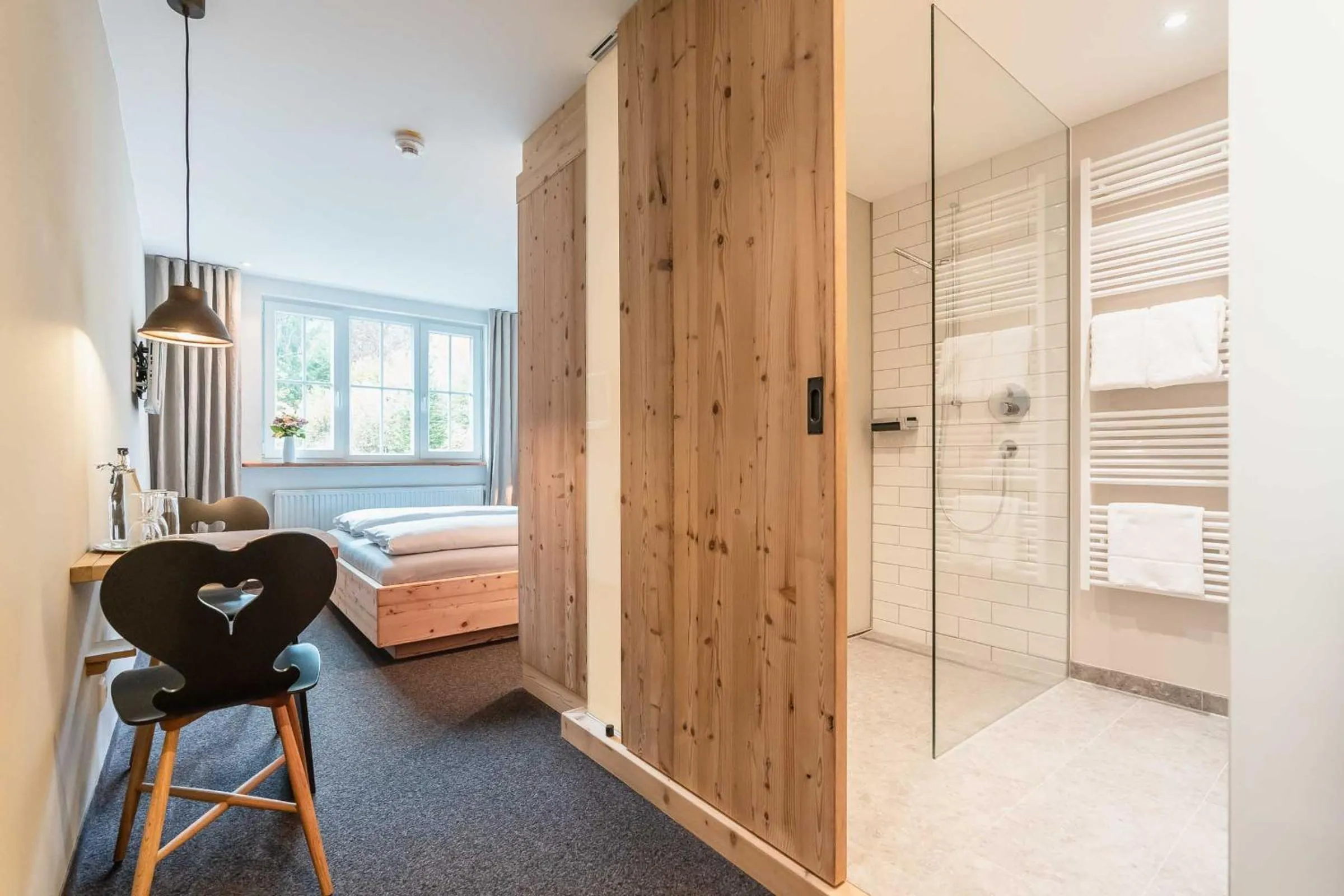 Photo of the whole room, Bed in Hotel Blaue Gams ***S