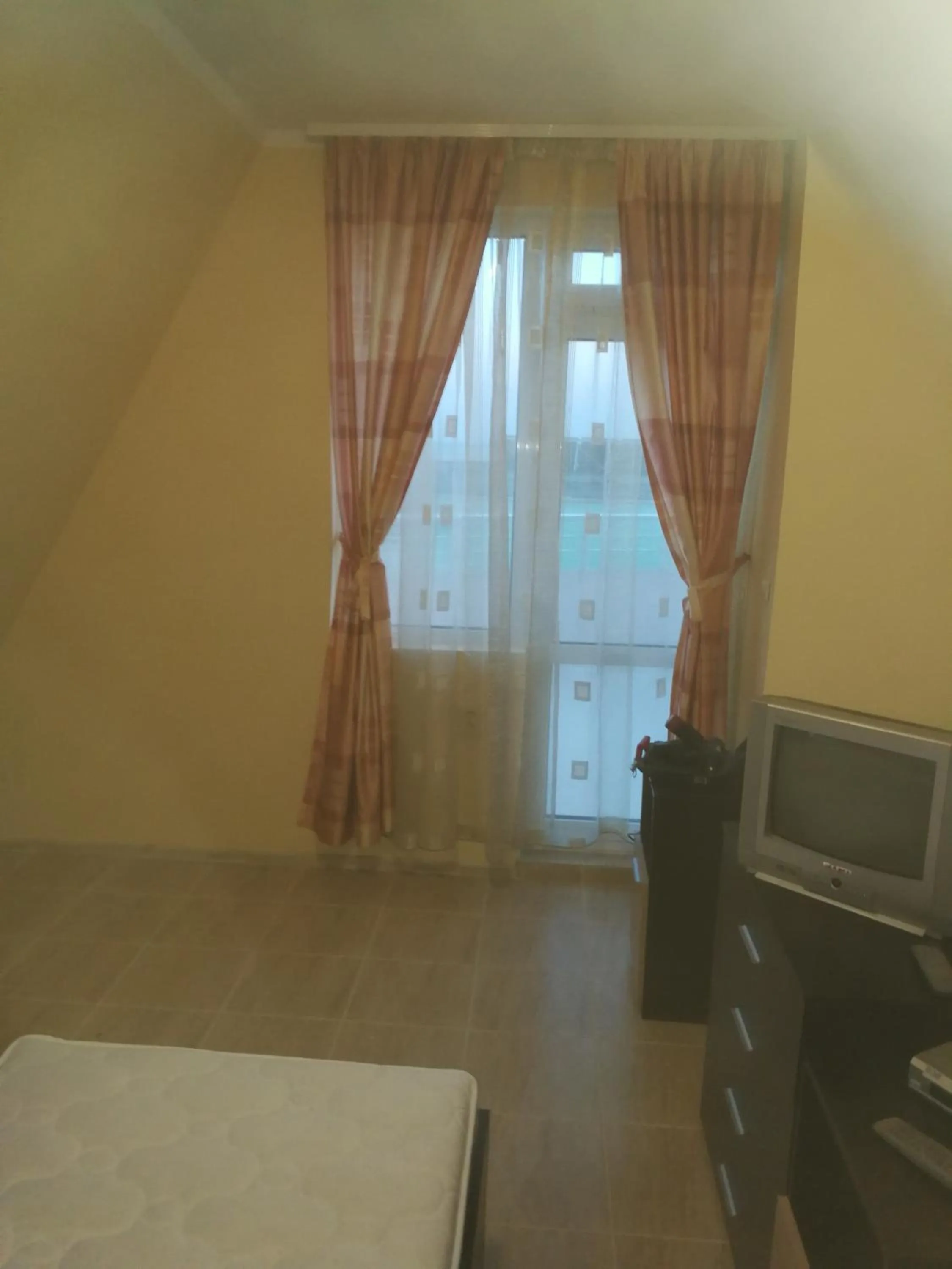 Bed in Femili Hotel Diveda