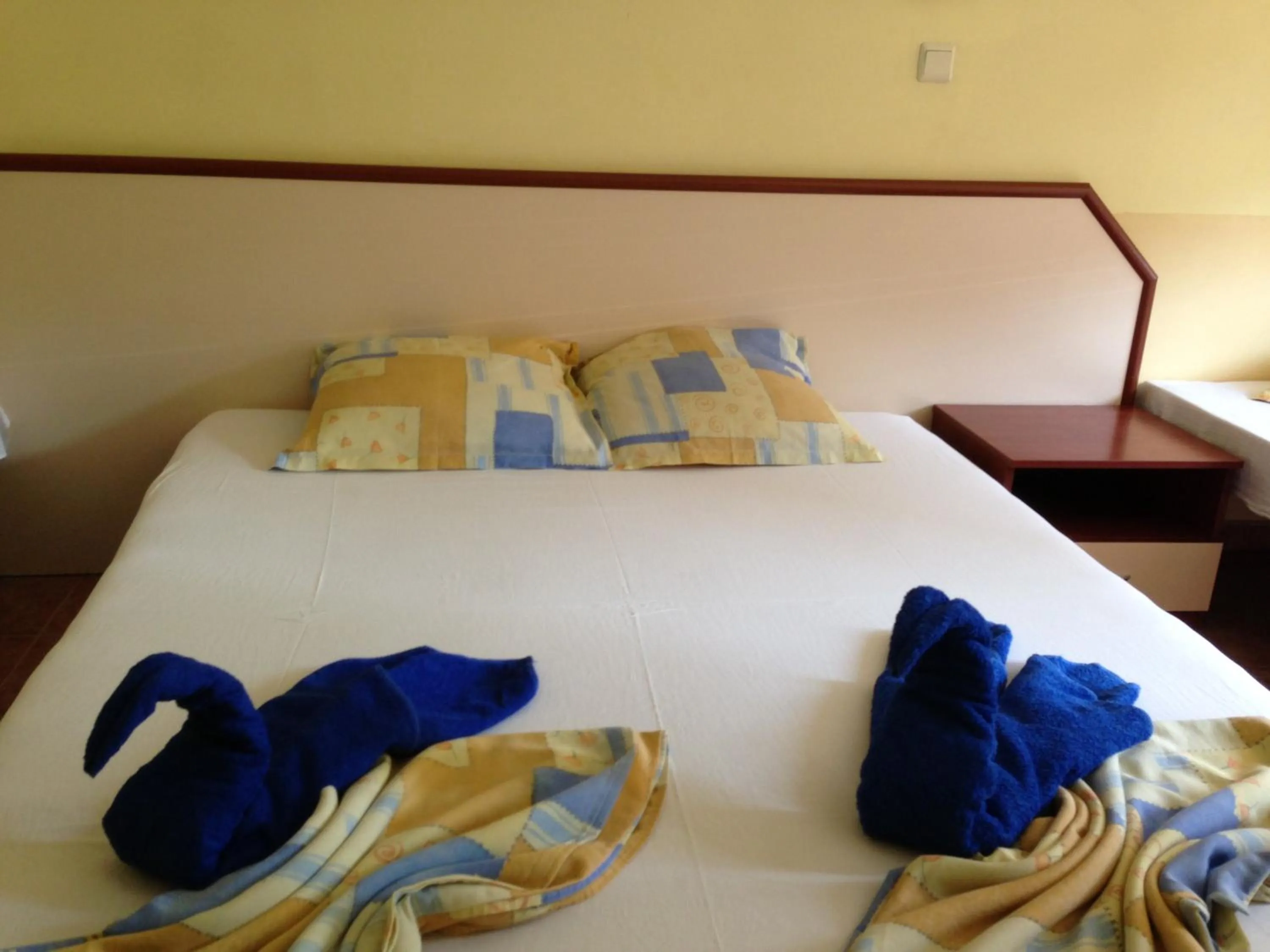 Bed in Femili Hotel Diveda