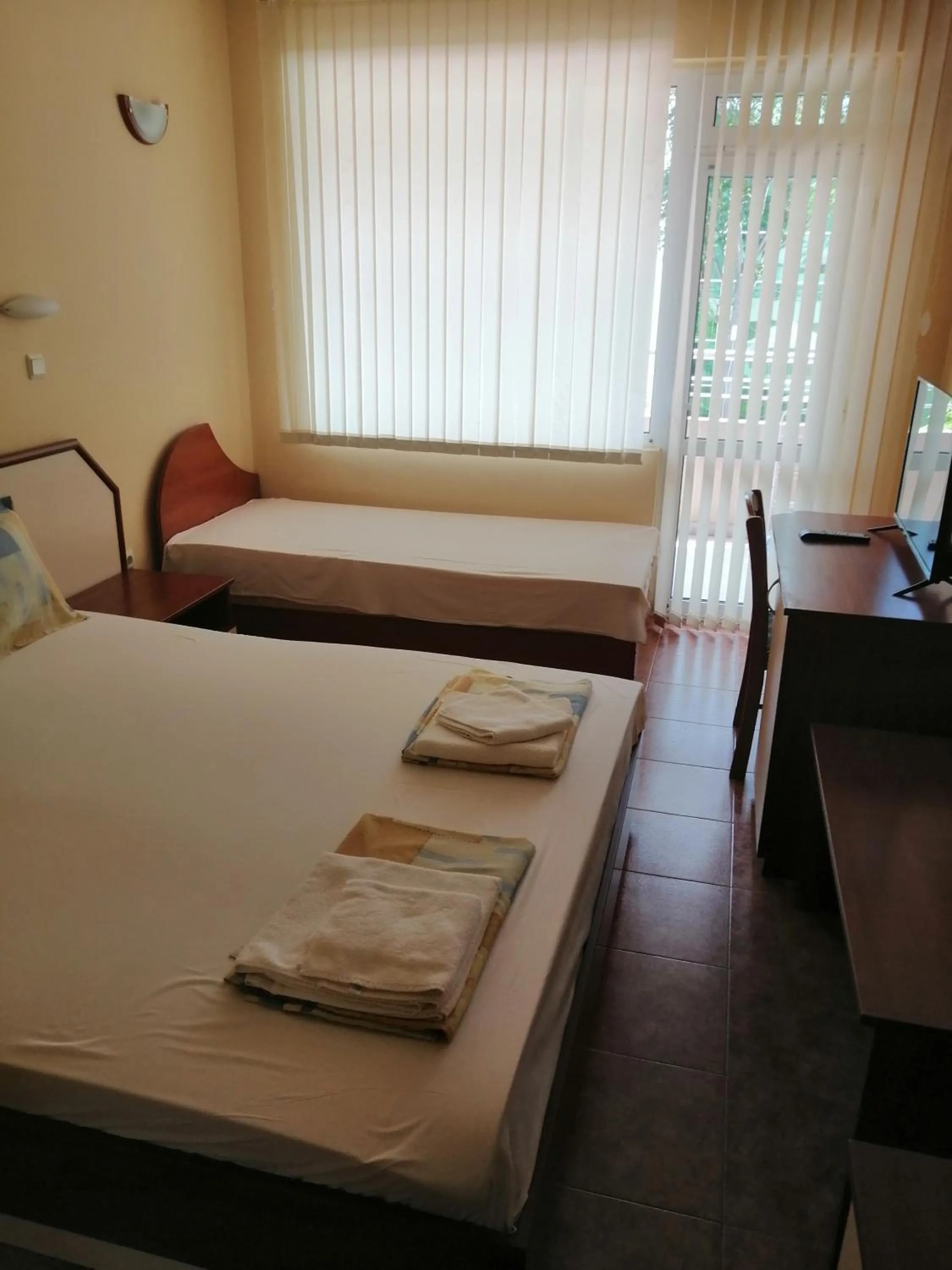 Bed in Femili Hotel Diveda