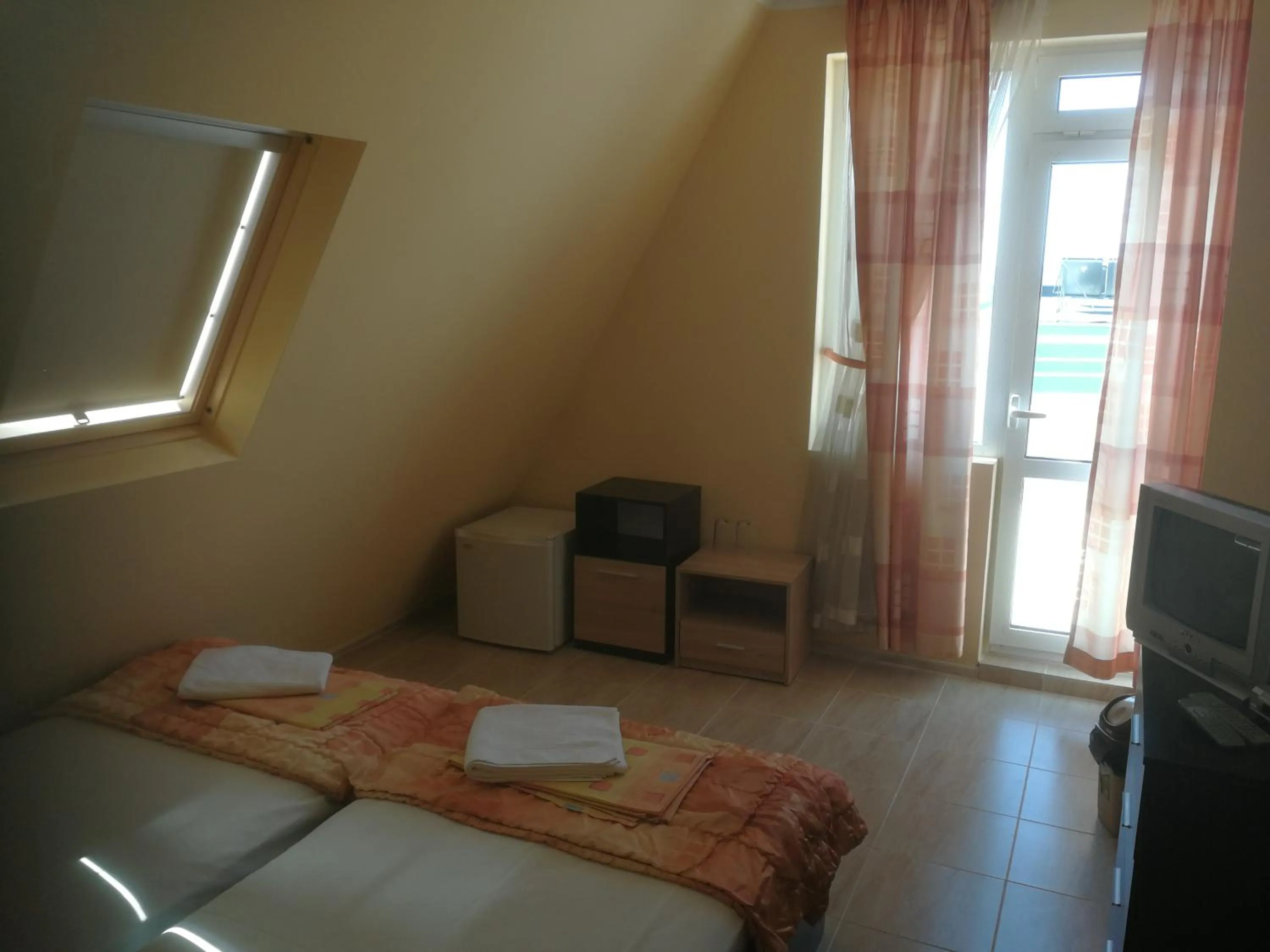 Bed in Femili Hotel Diveda