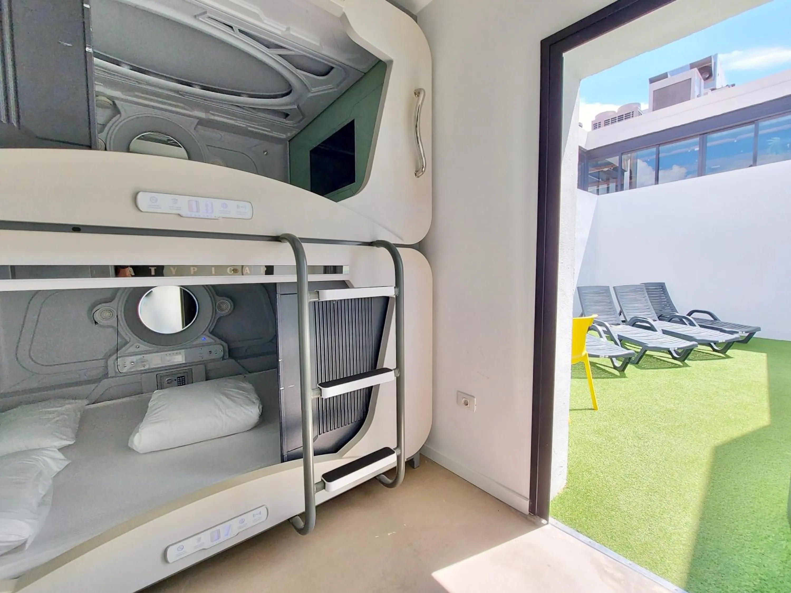 Patio in Atypicap Capsule Hostel