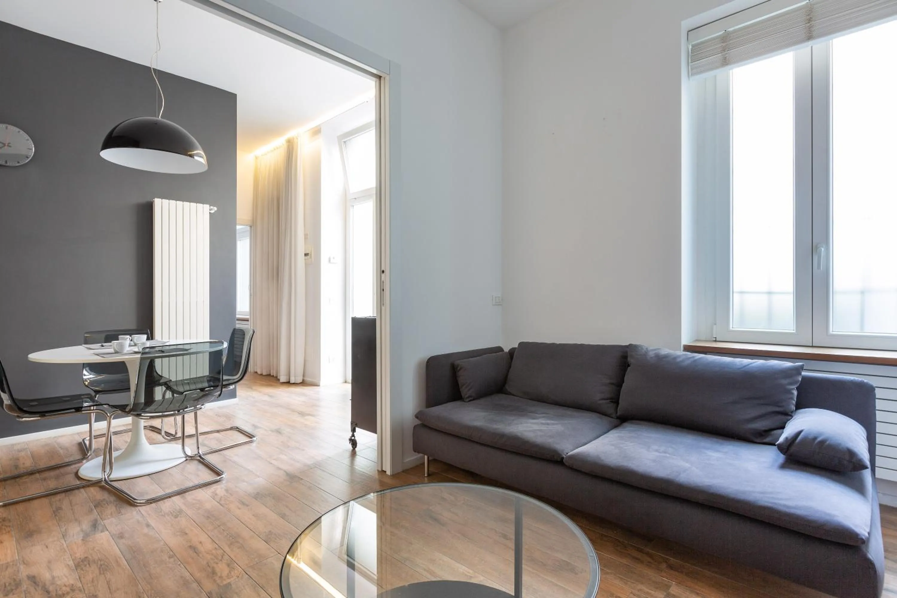 Living room in EasyTopStay - Tricolore Modern and Cozy Apartment