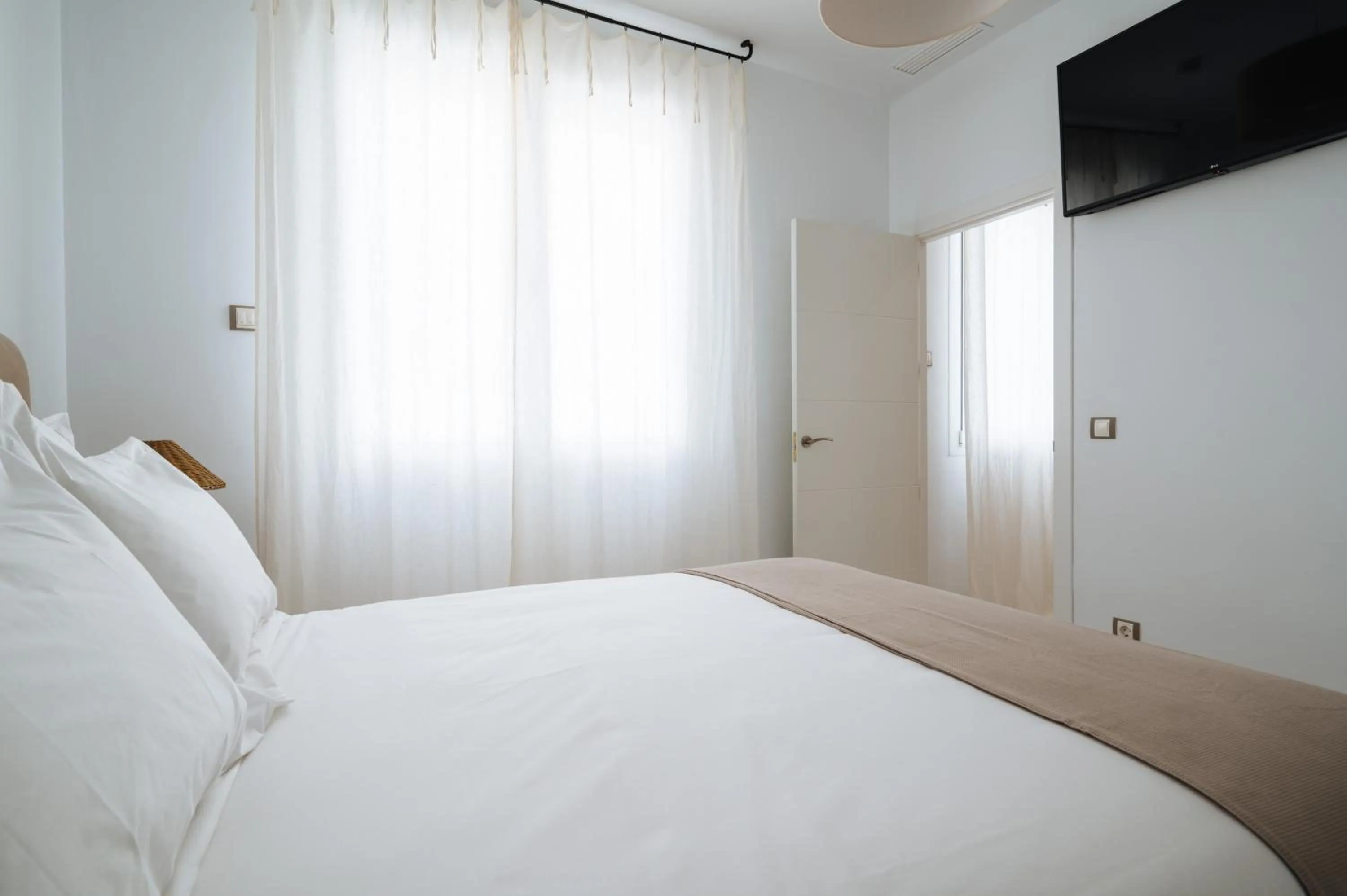 Bed in Apartamentos "El Escondite de Triana"