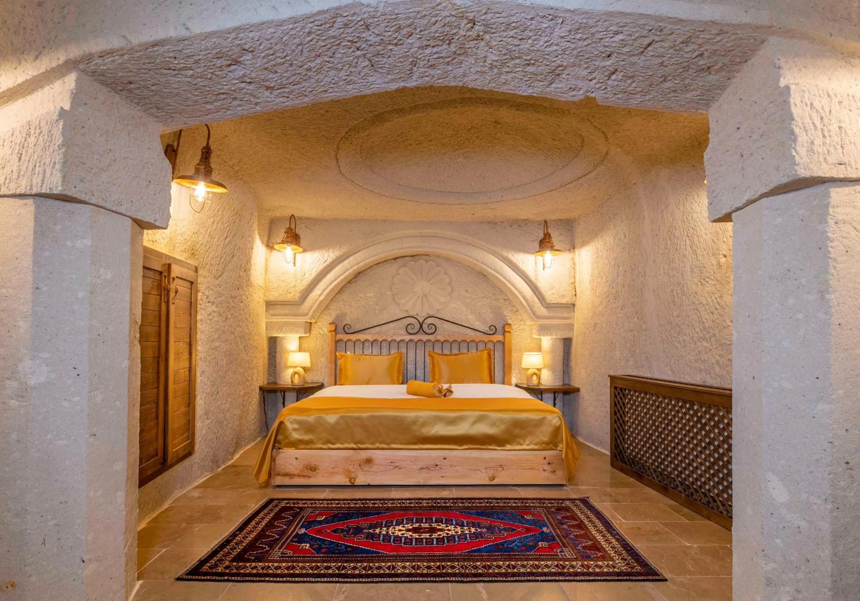 Bed in Helen Cave Suites