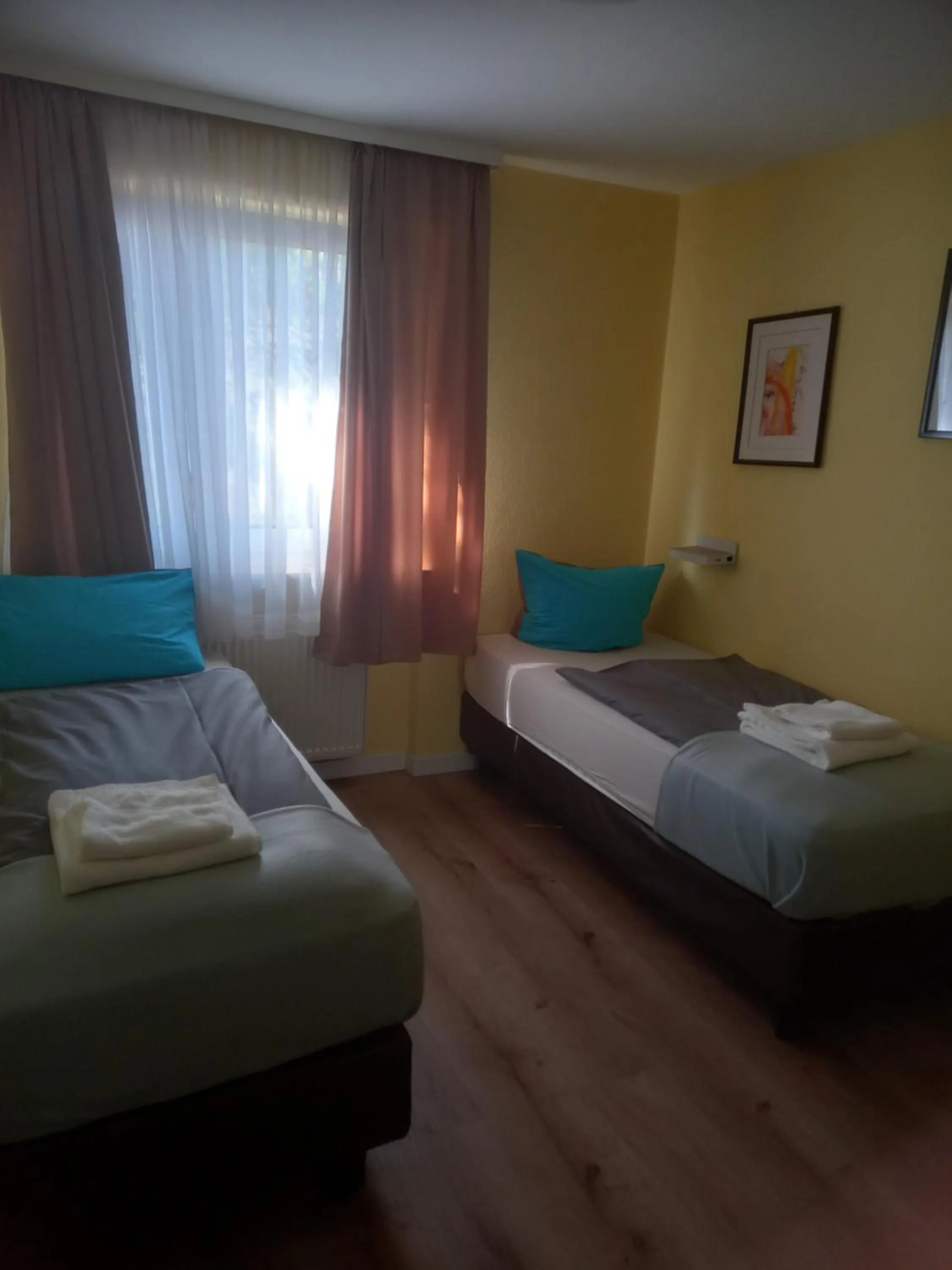 Bed in Hotel Wiesbadener Hof