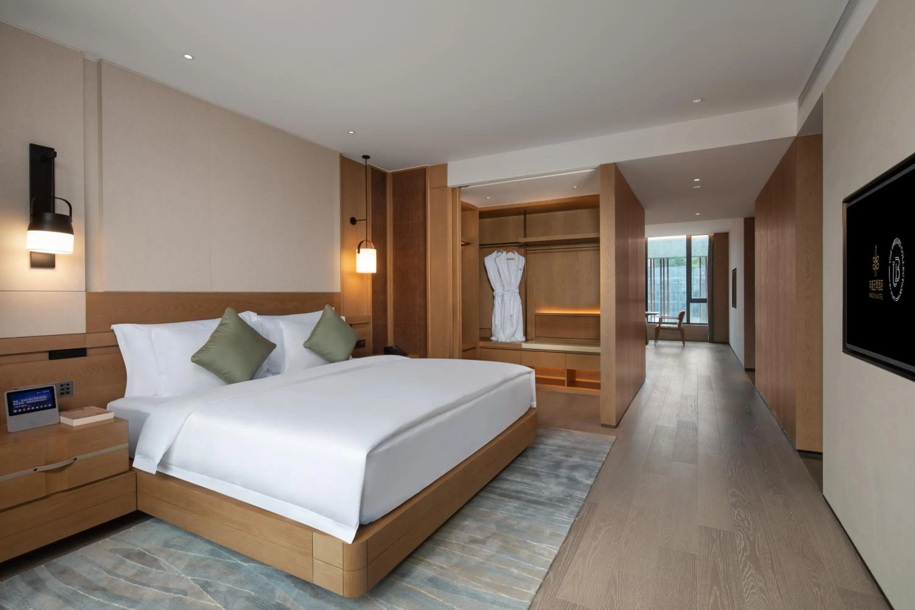Photo of the whole room, Bed in Grand WUJI Hotel, in The Unbound Collection by Hyatt