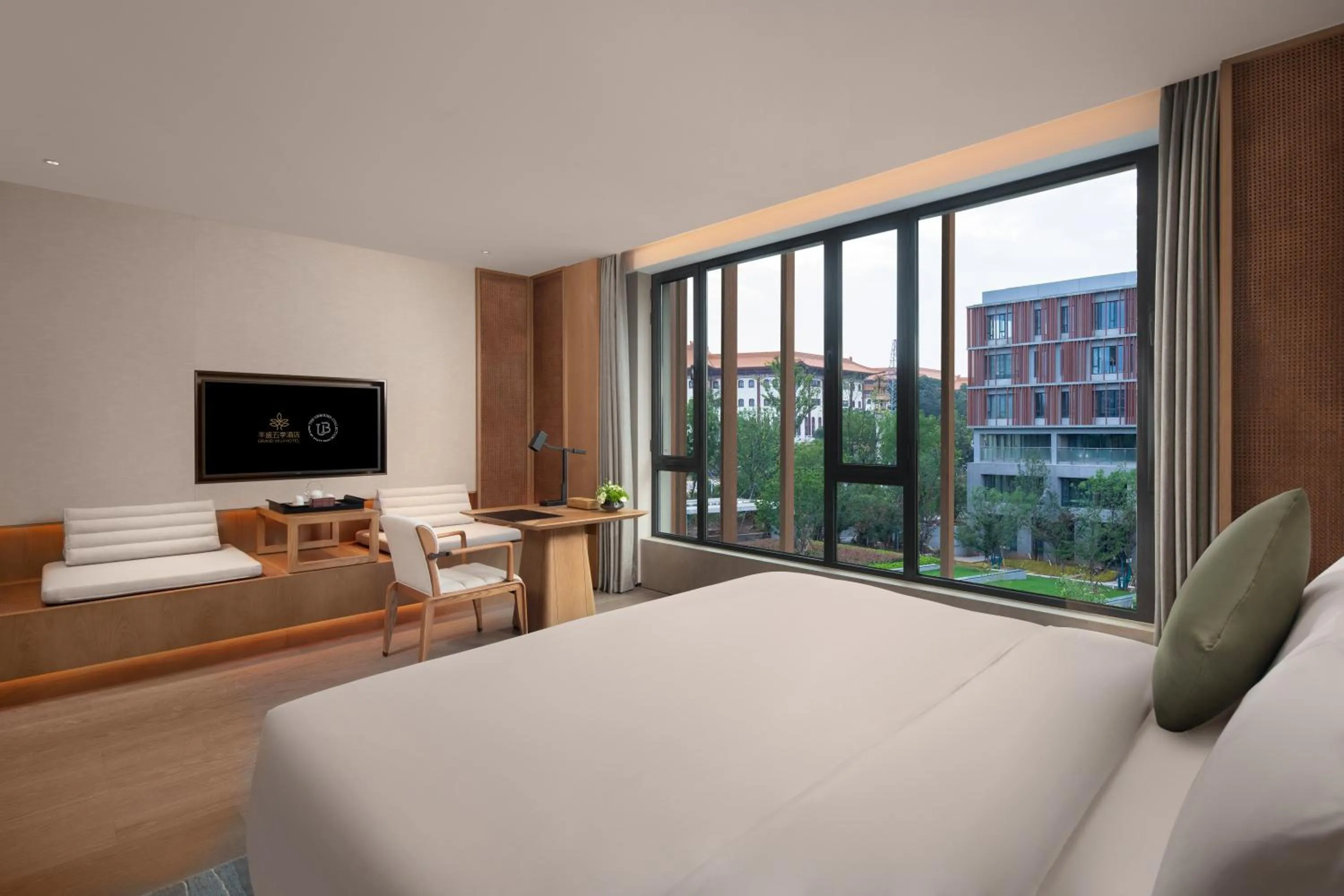 Photo of the whole room, Bed in Grand WUJI Hotel, in The Unbound Collection by Hyatt