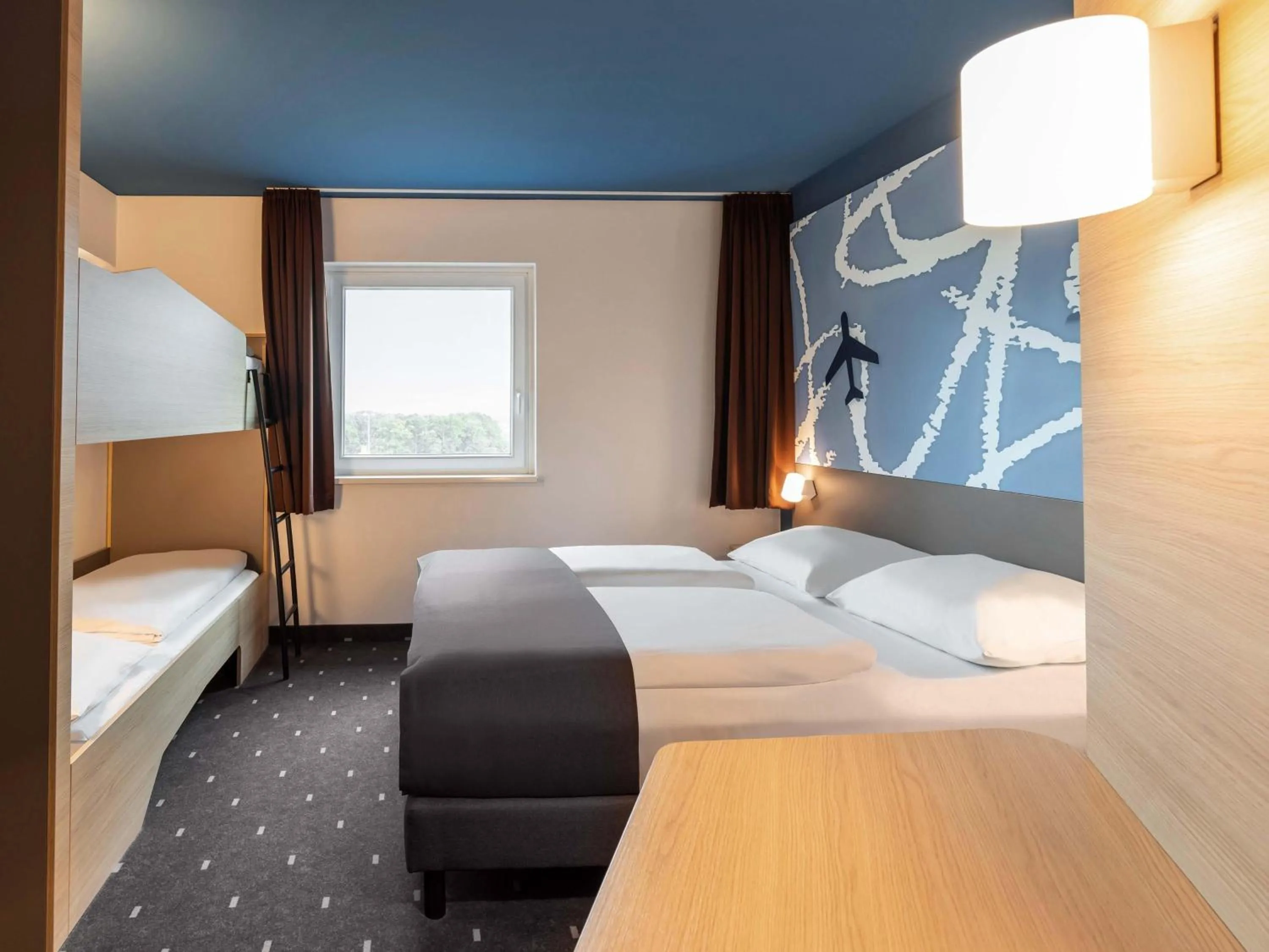 Photo of the whole room, Bed in B&B HOTEL Frankfurt-Hahn Airport