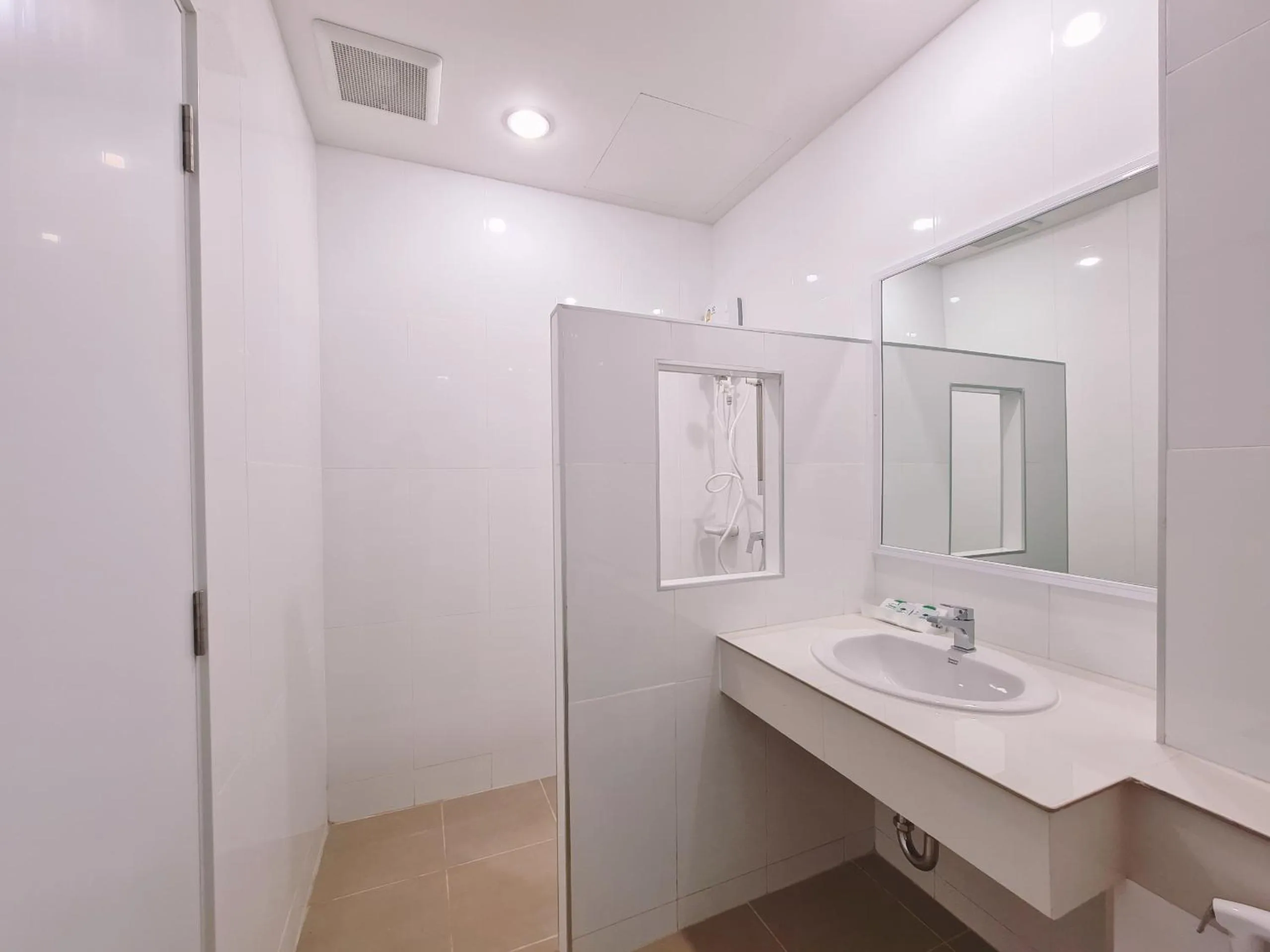 Bathroom in Grand Maihom Hotel