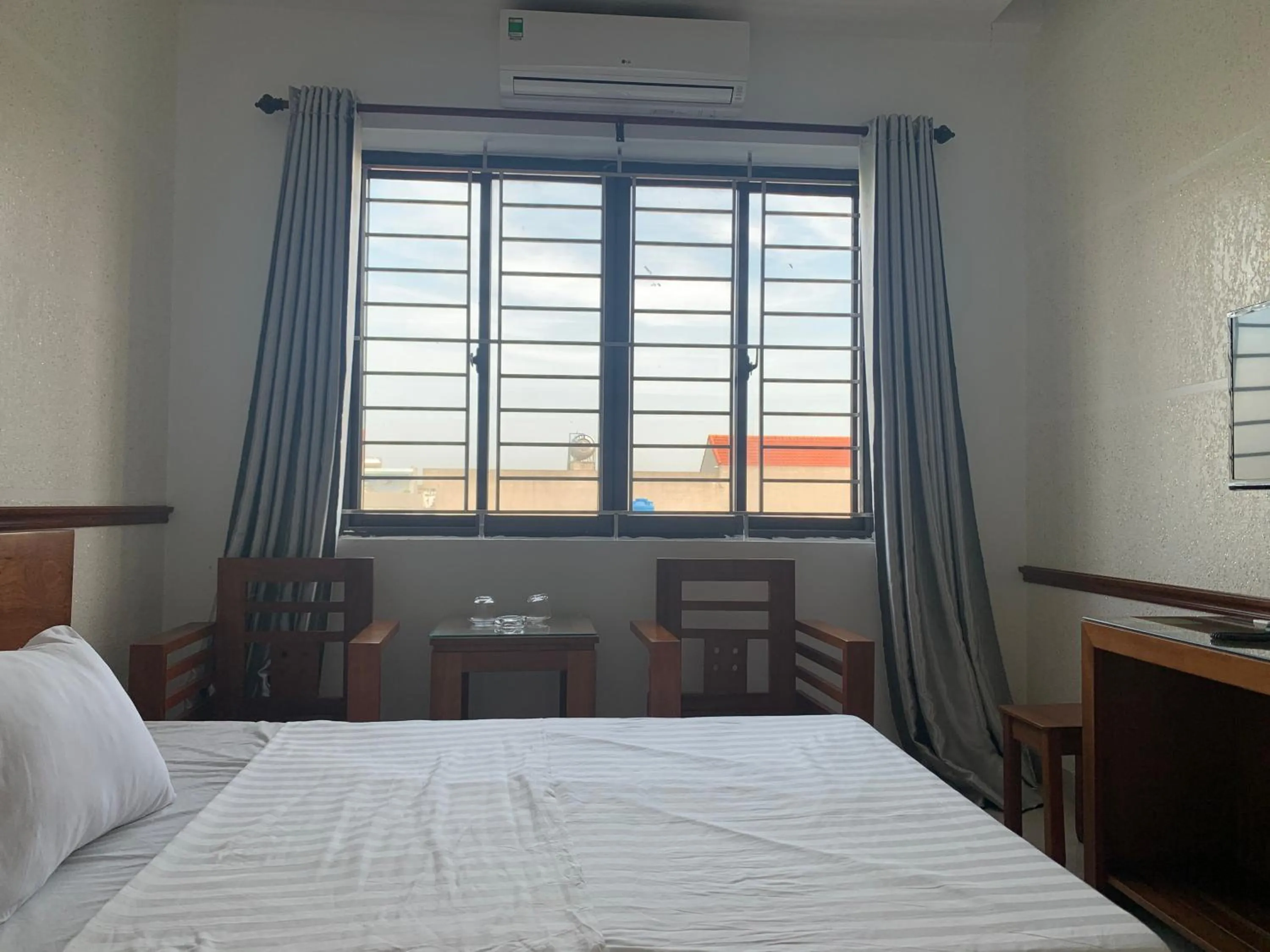 Bed in Hưng Thành Riverside Hotel