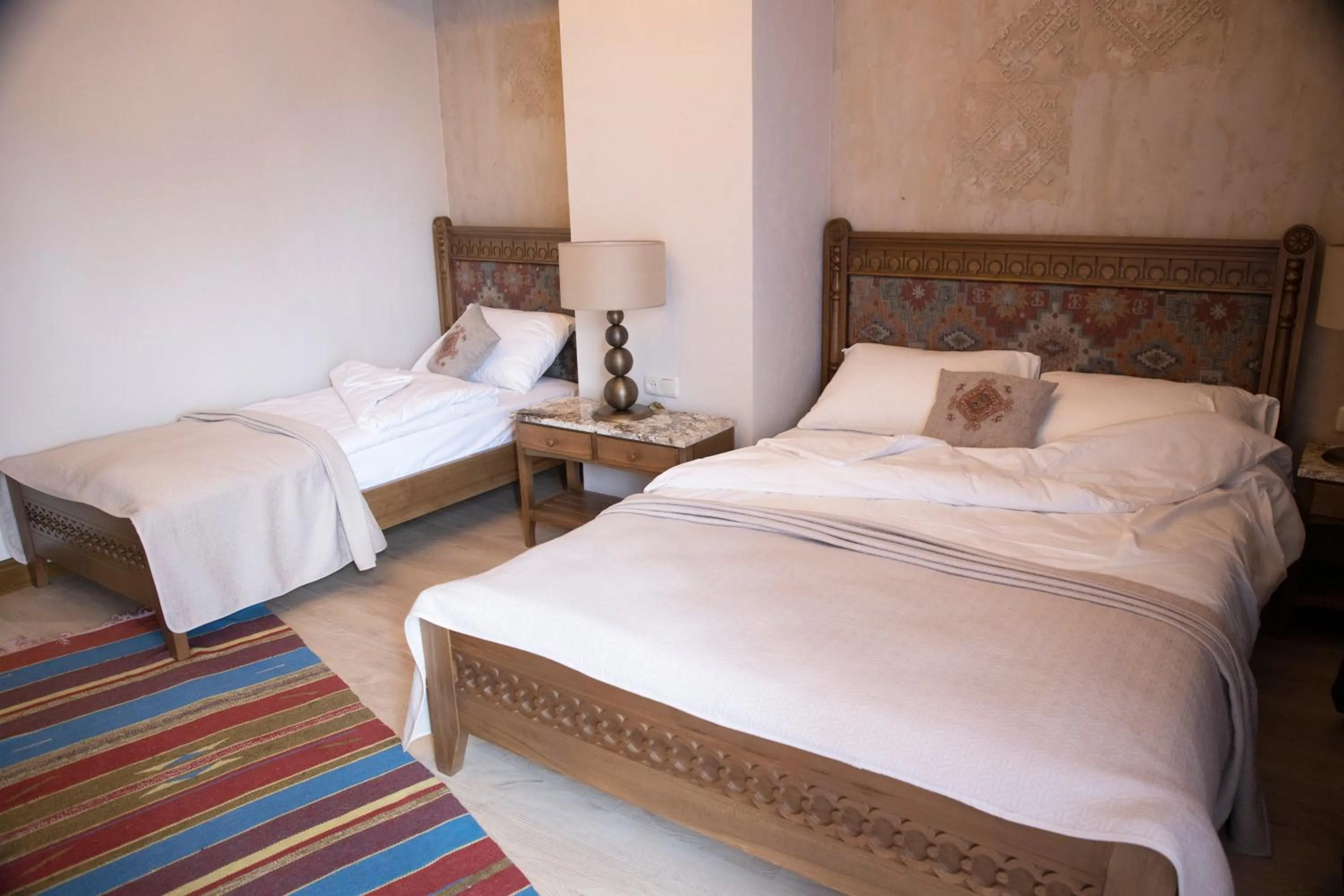Bed in Boutique ETHNO HOTEL