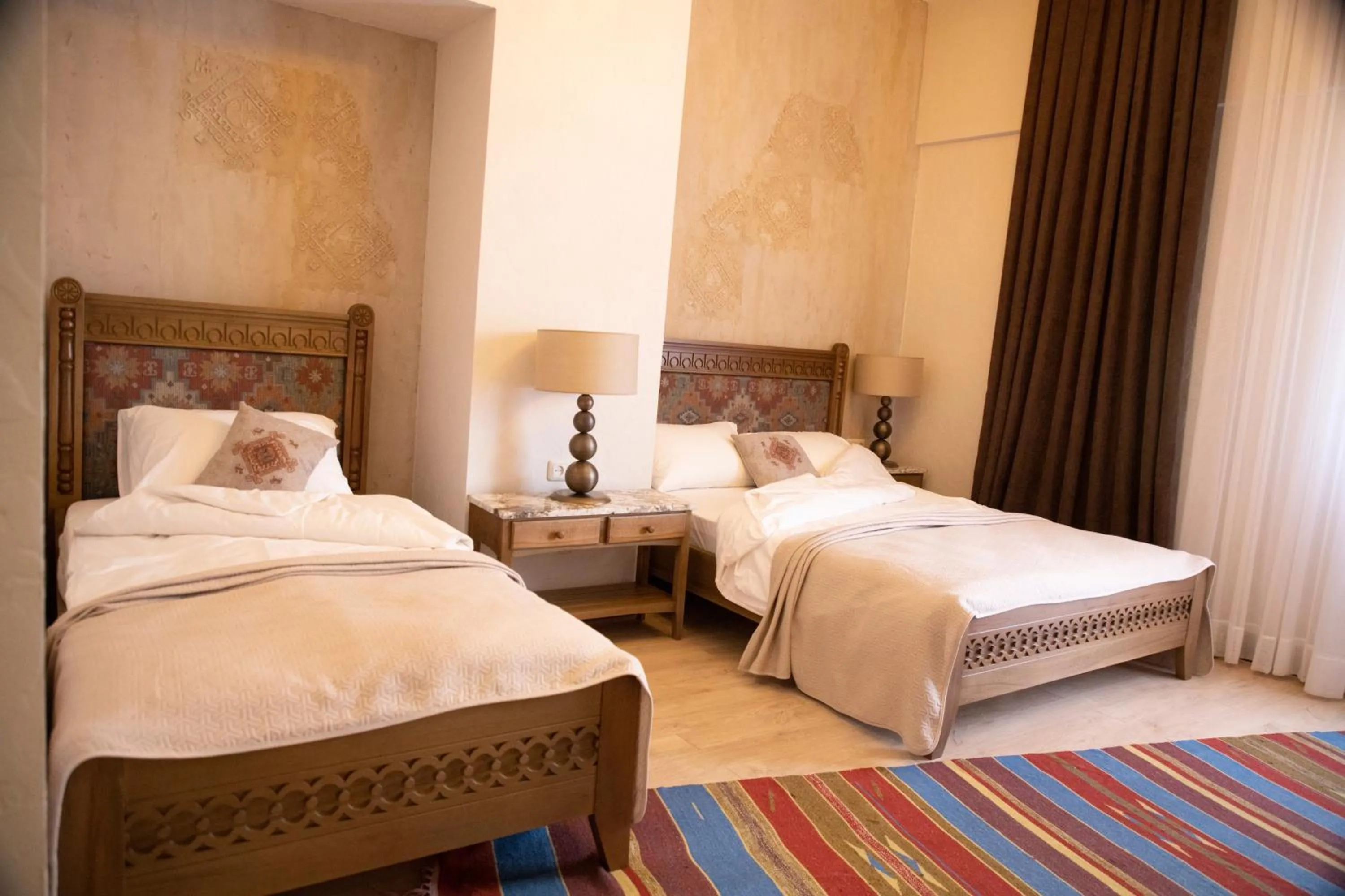 Bed in Boutique ETHNO HOTEL