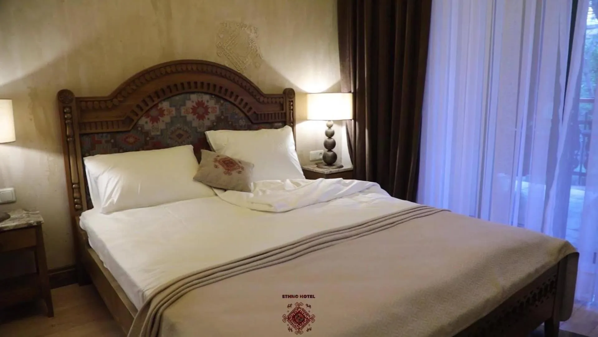 Bed in Boutique ETHNO HOTEL