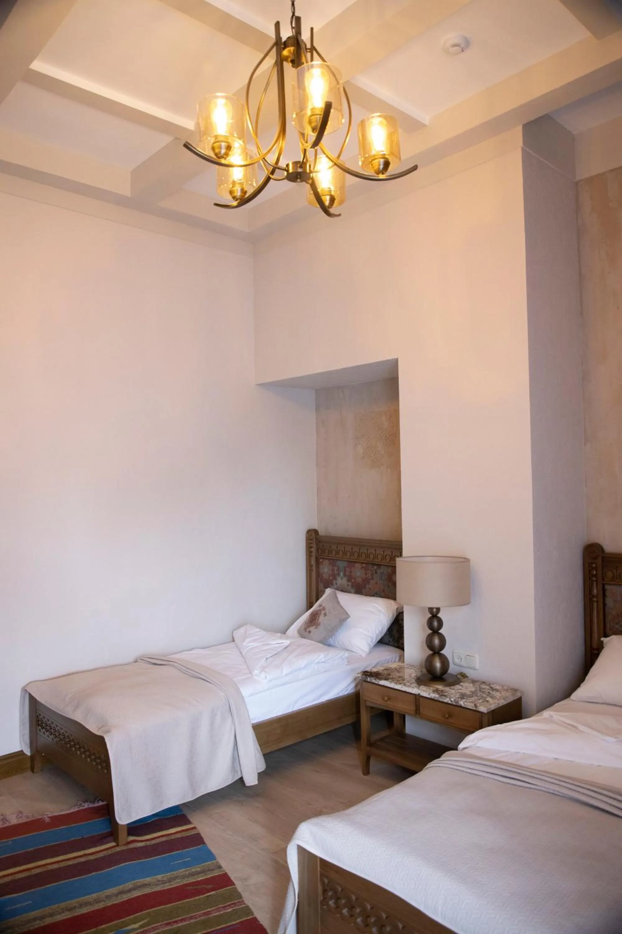 Bed in Boutique ETHNO HOTEL