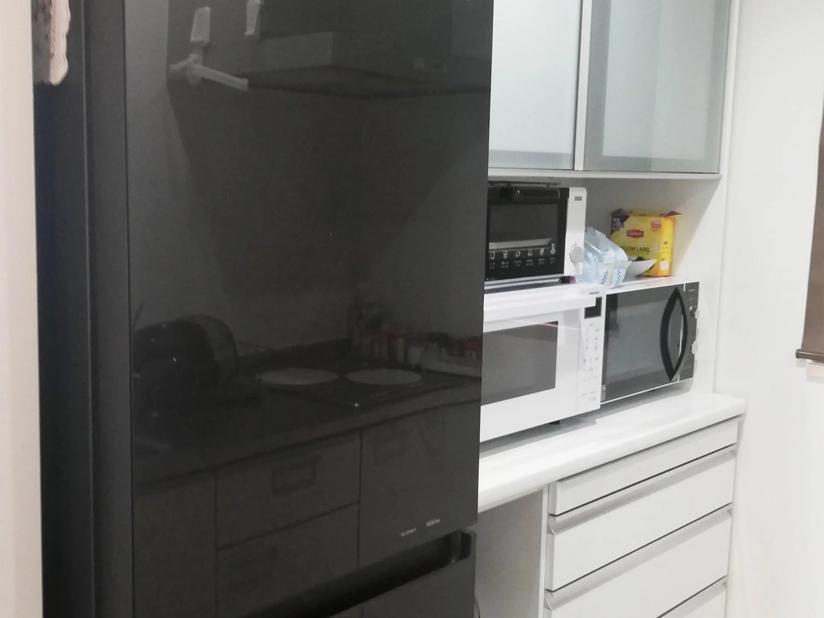 Communal kitchen in Room Biotop YOMITAN