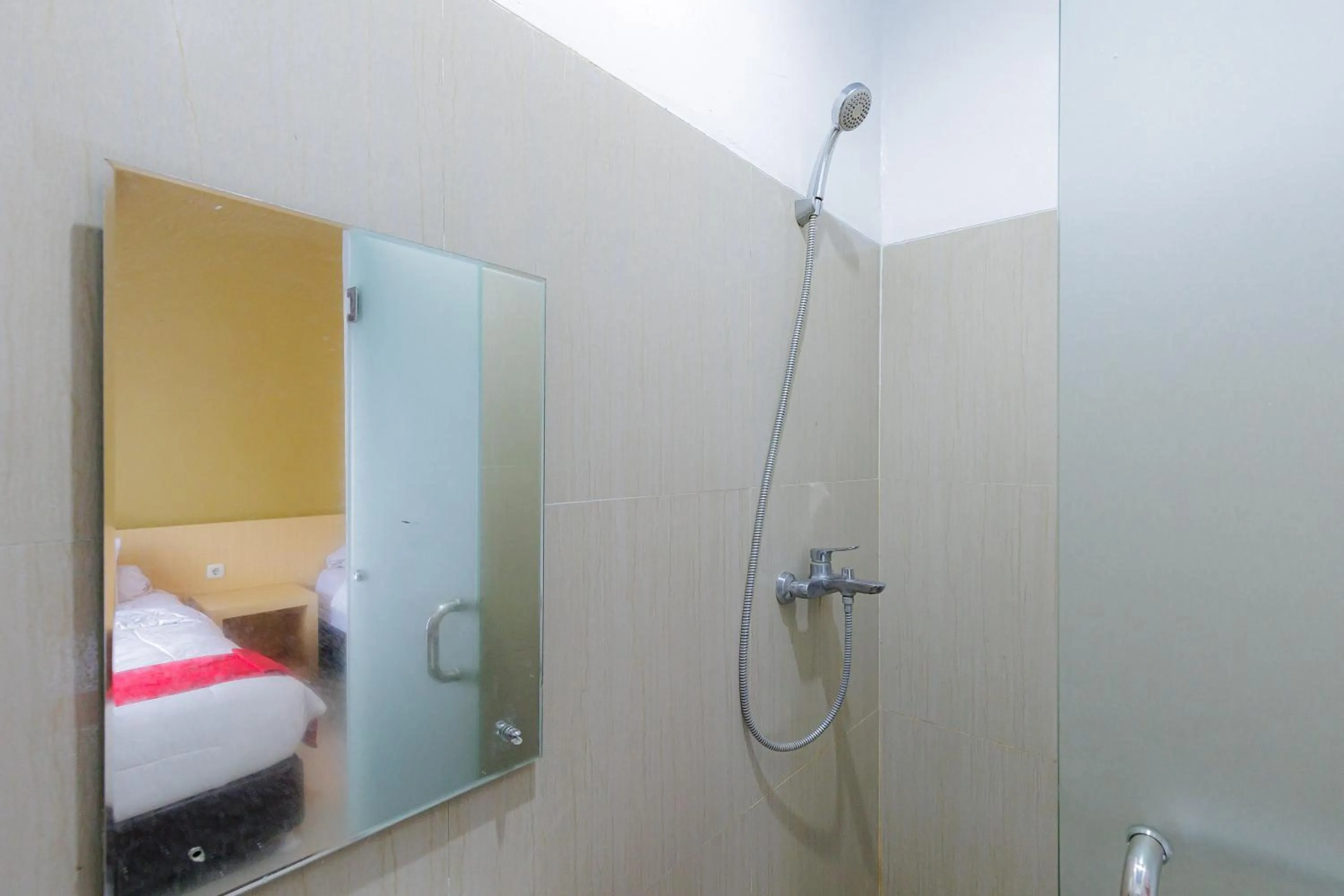 Bathroom in RedDoorz Plus Syariah near Museum Lampung
