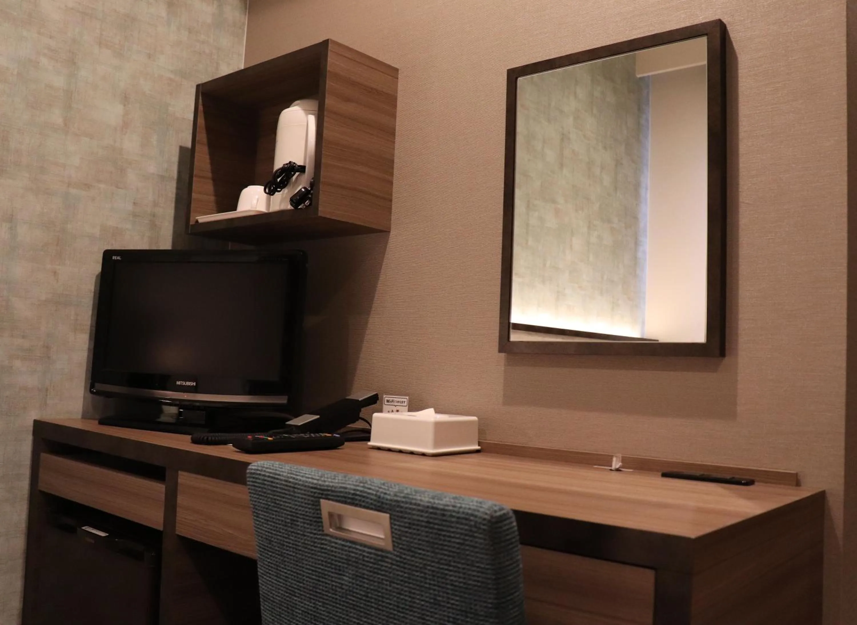 Photo of the whole room in Tourist Inn Kochi