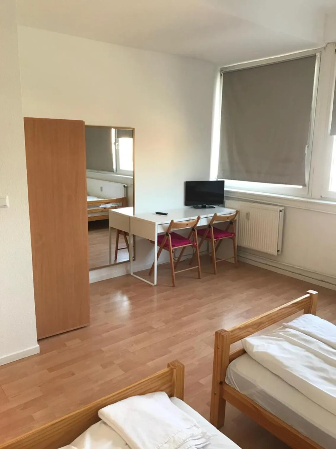 Photo of the whole room, TV/Entertainment Center in City Inn