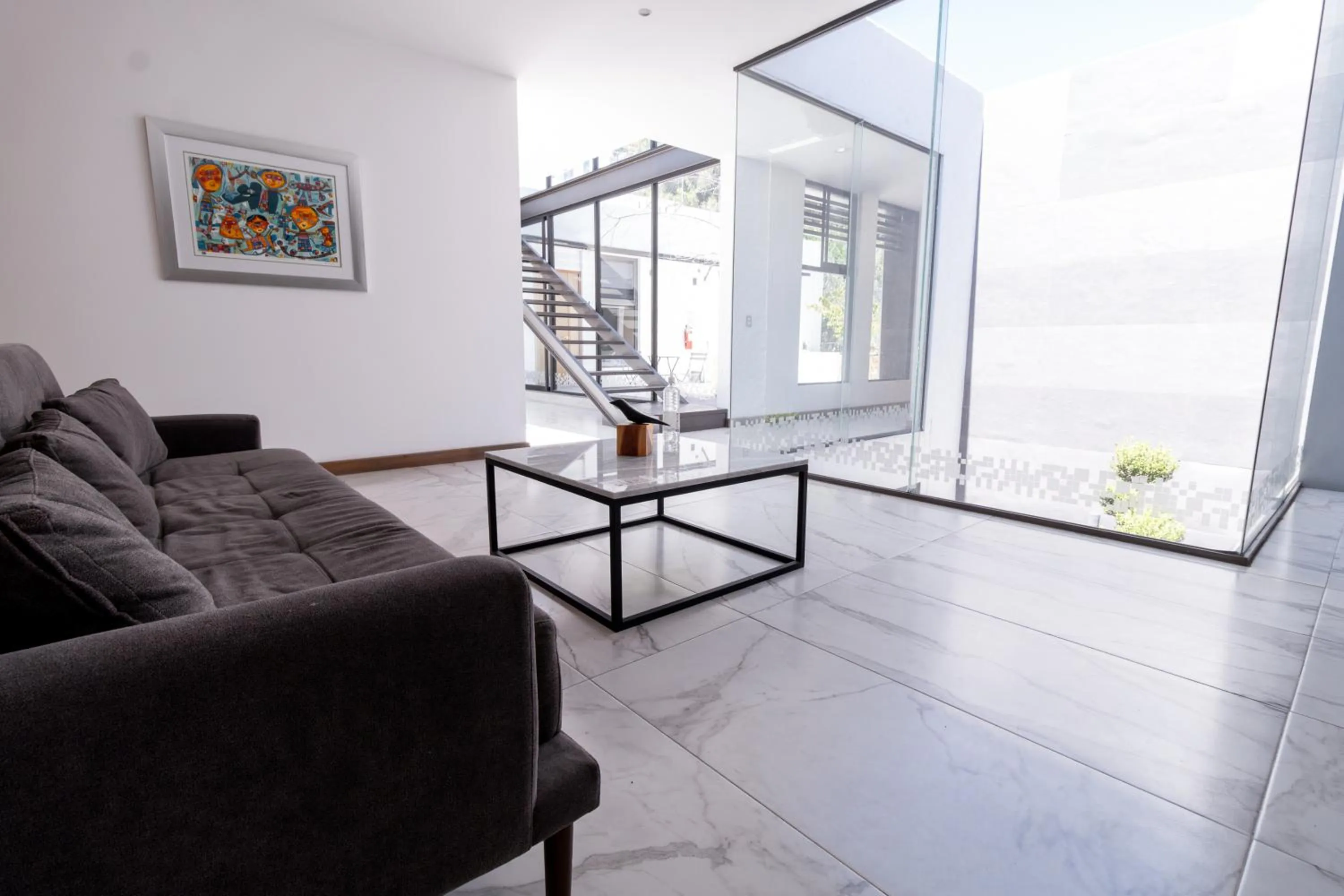 Living room in Urban Puebla by Grupo Amber