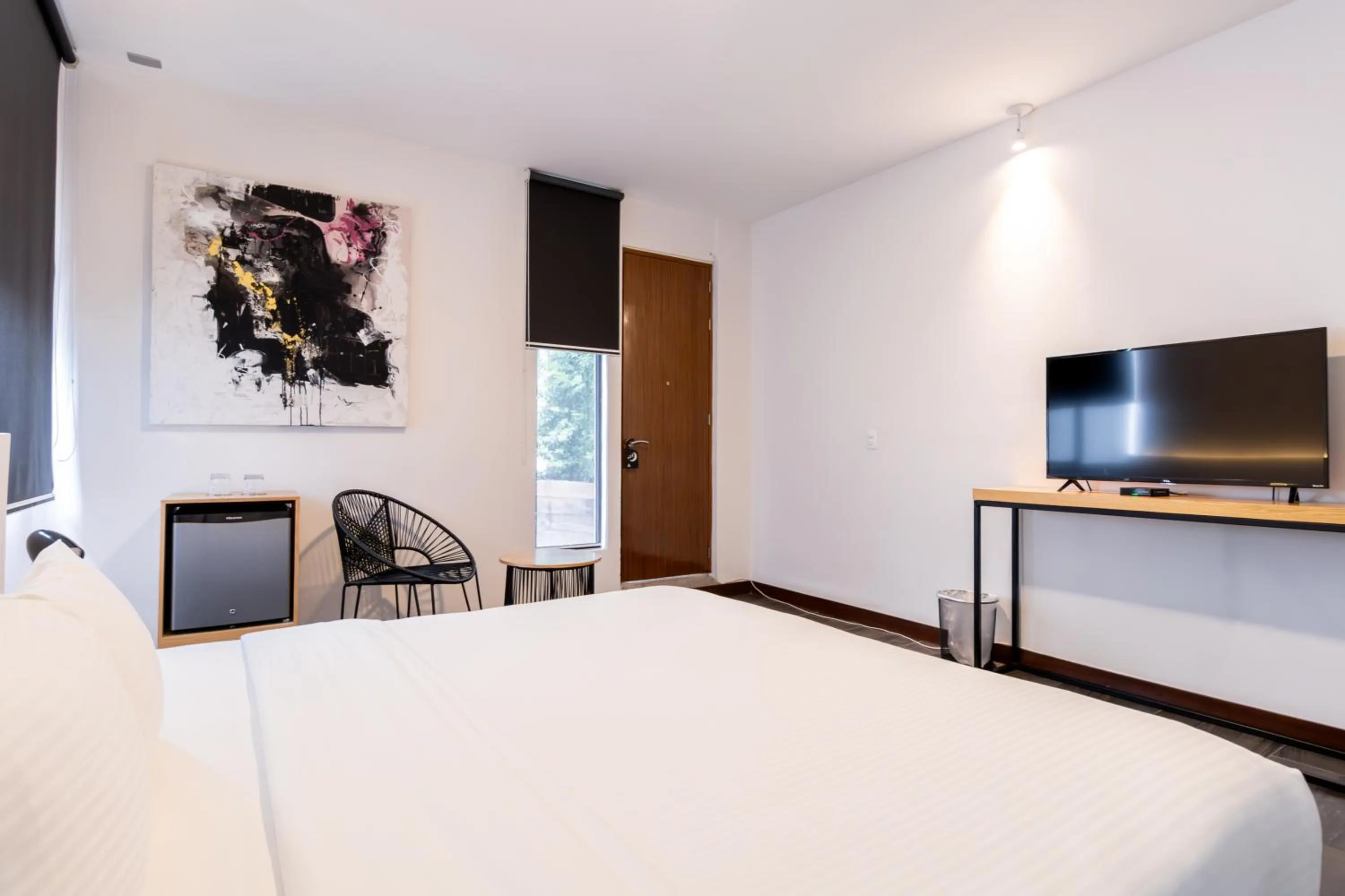 Bed in Urban Puebla by Grupo Amber