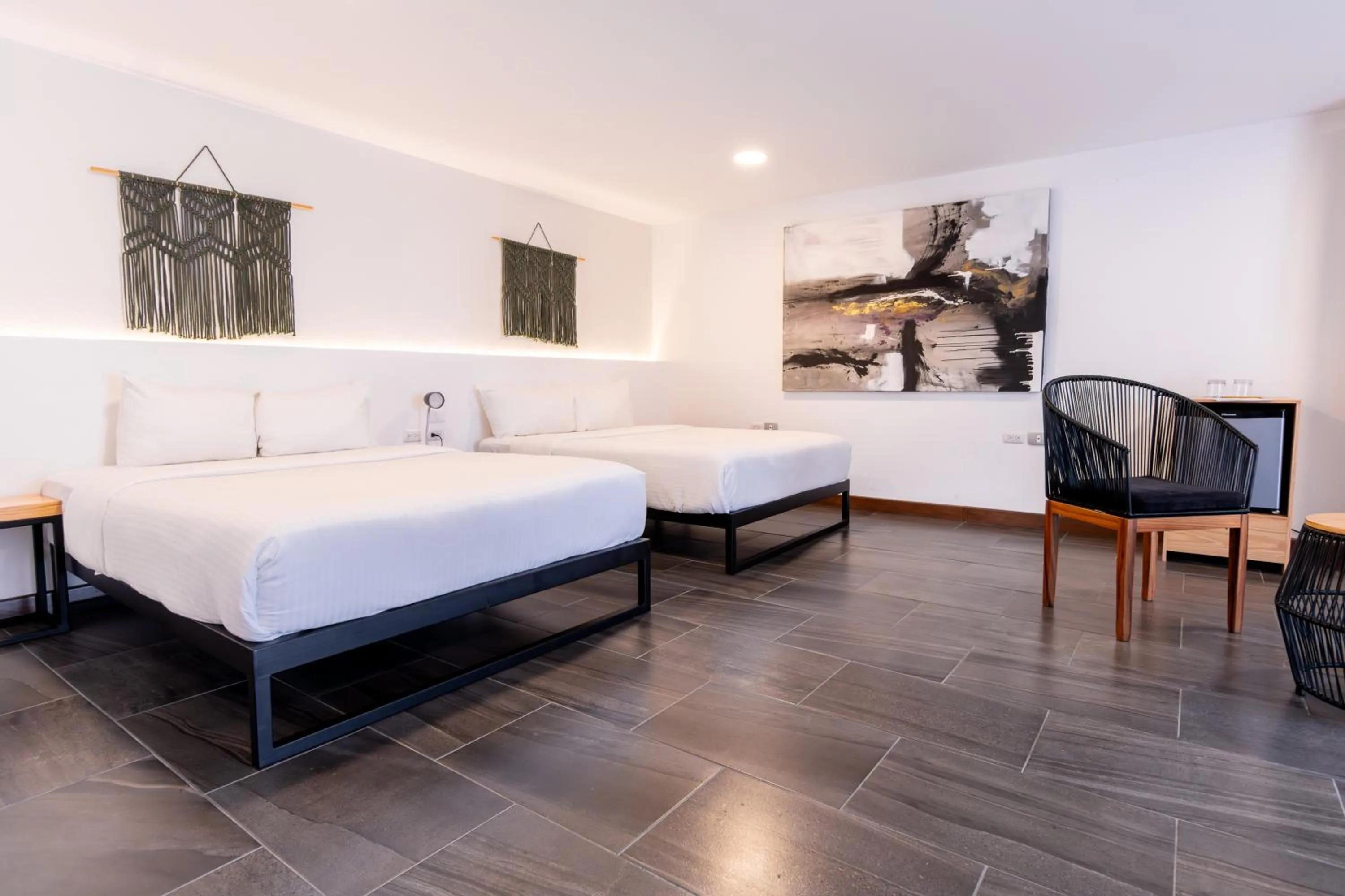 Bed in Urban Puebla by Grupo Amber