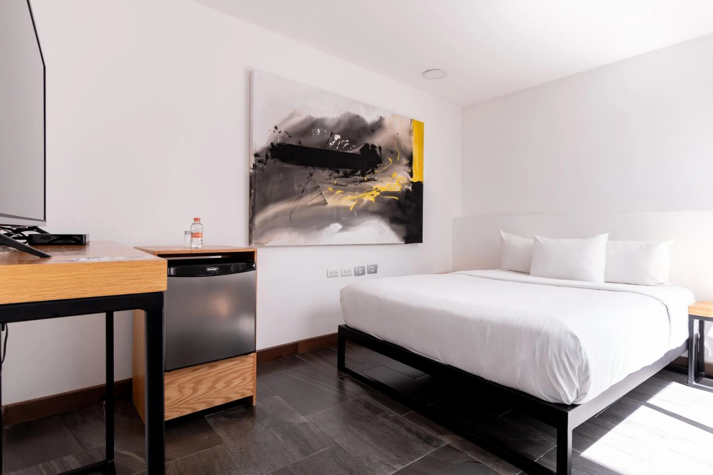 Bed in Urban Puebla by Grupo Amber