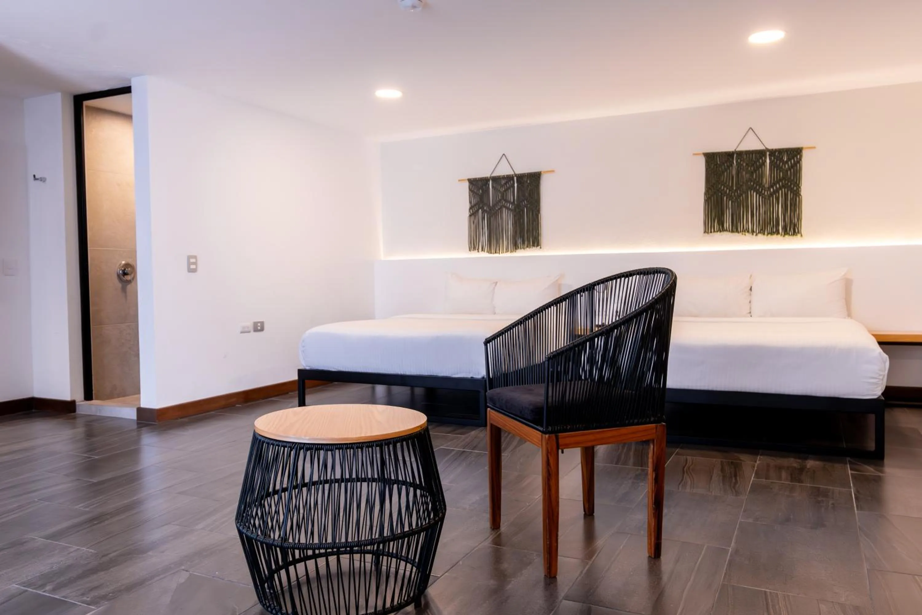 Bed in Urban Puebla by Grupo Amber