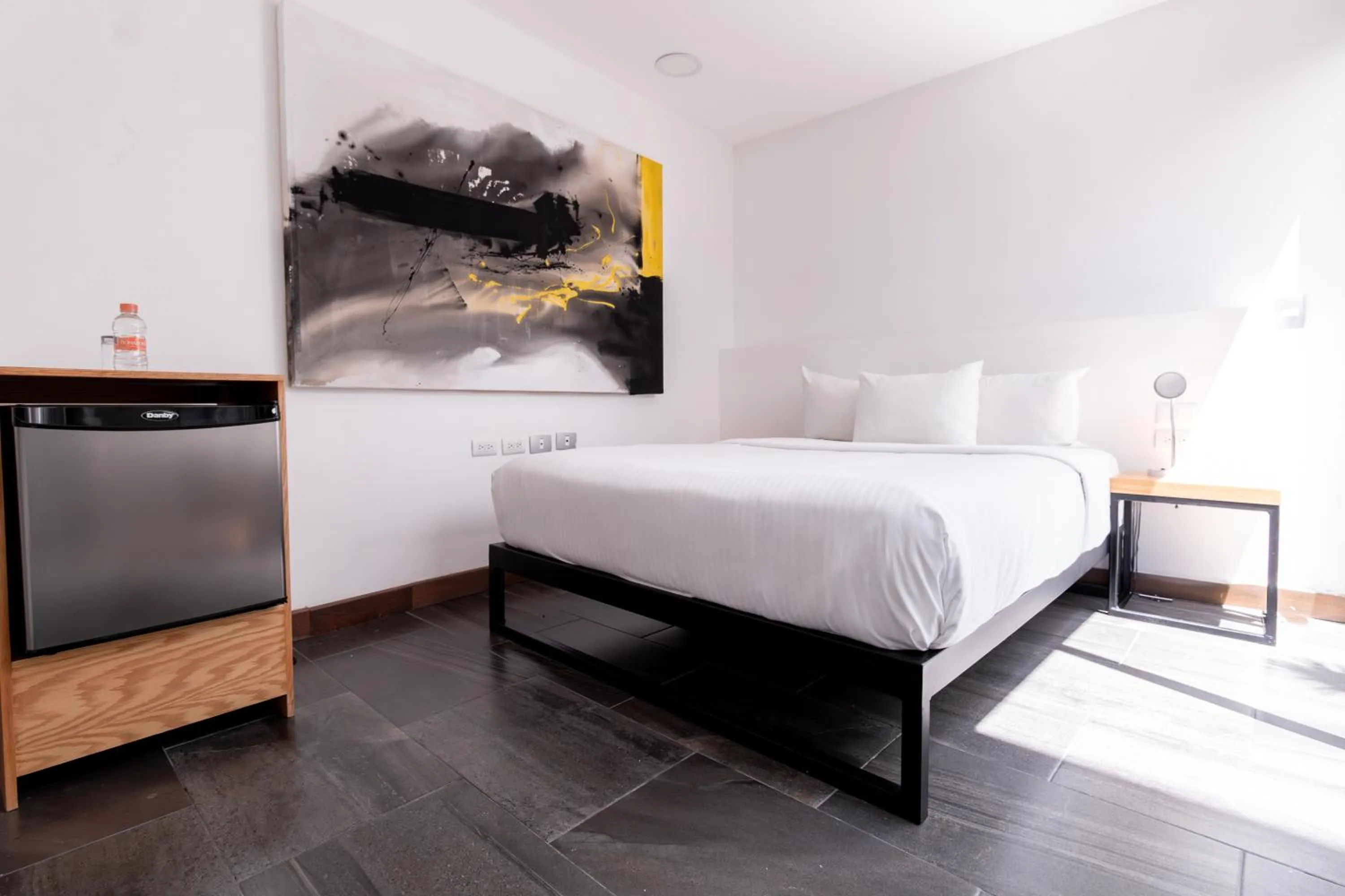 Bed in Urban Puebla by Grupo Amber