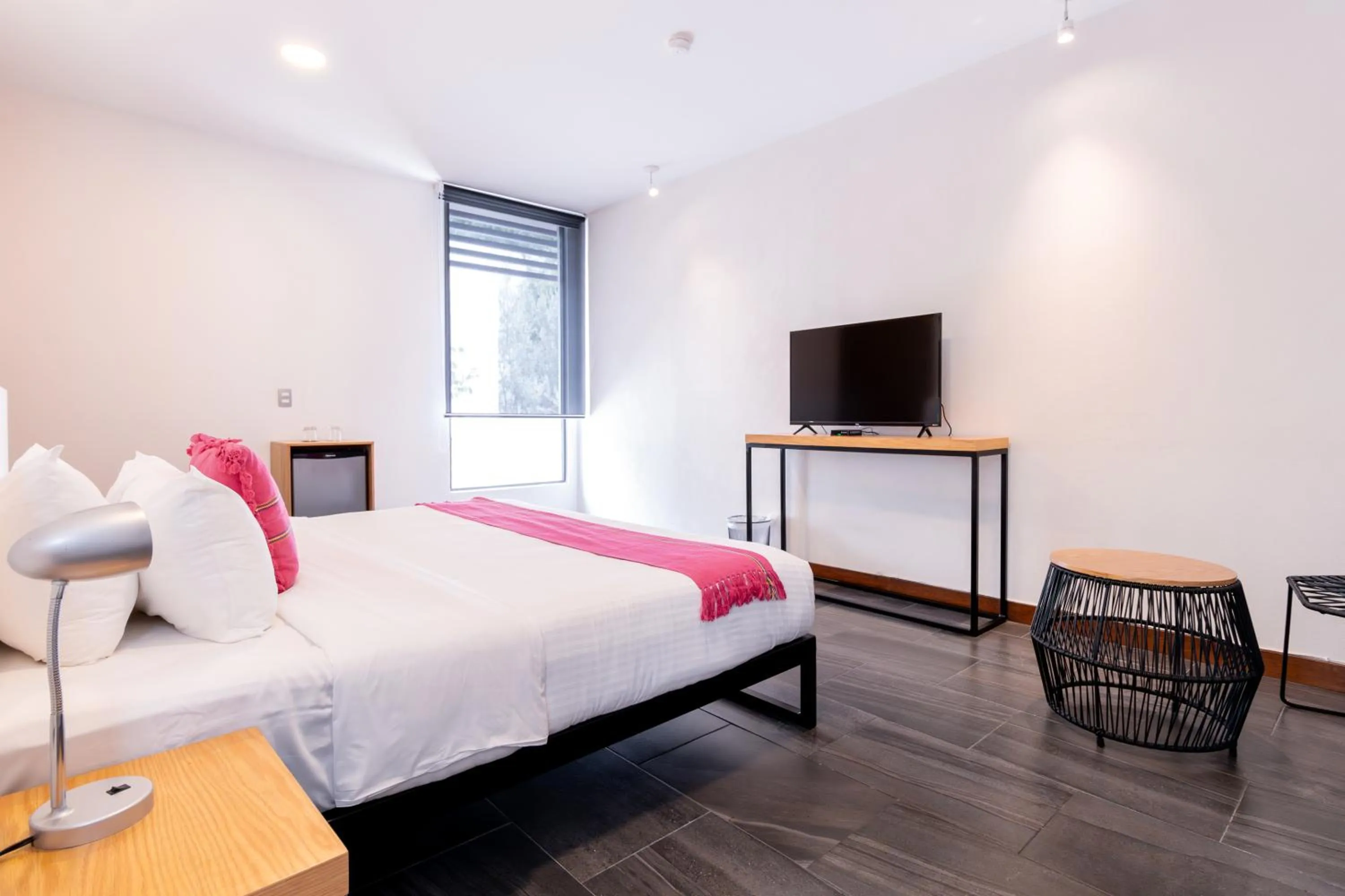 Bed in Urban Puebla by Grupo Amber