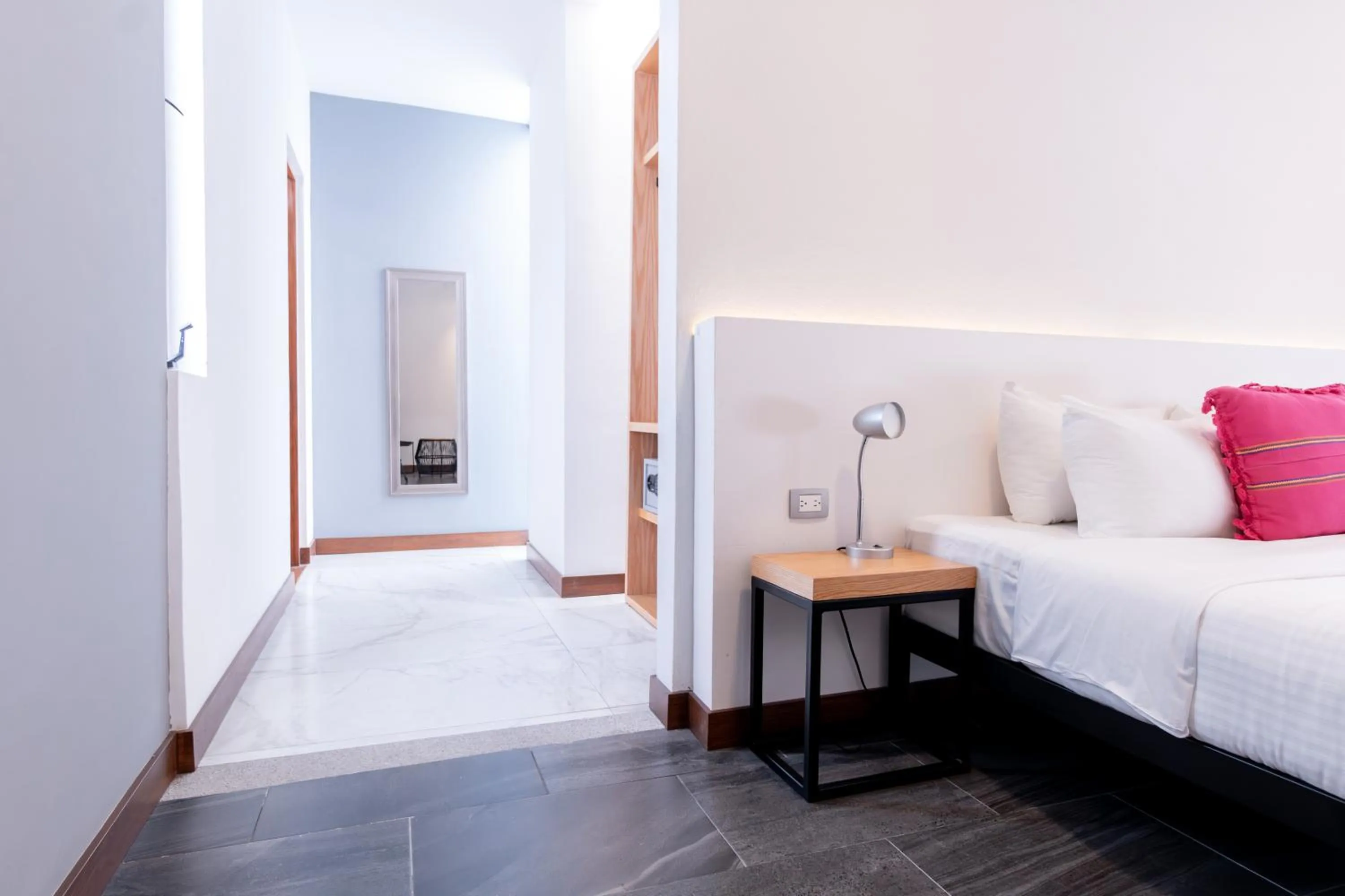 Bed in Urban Puebla by Grupo Amber