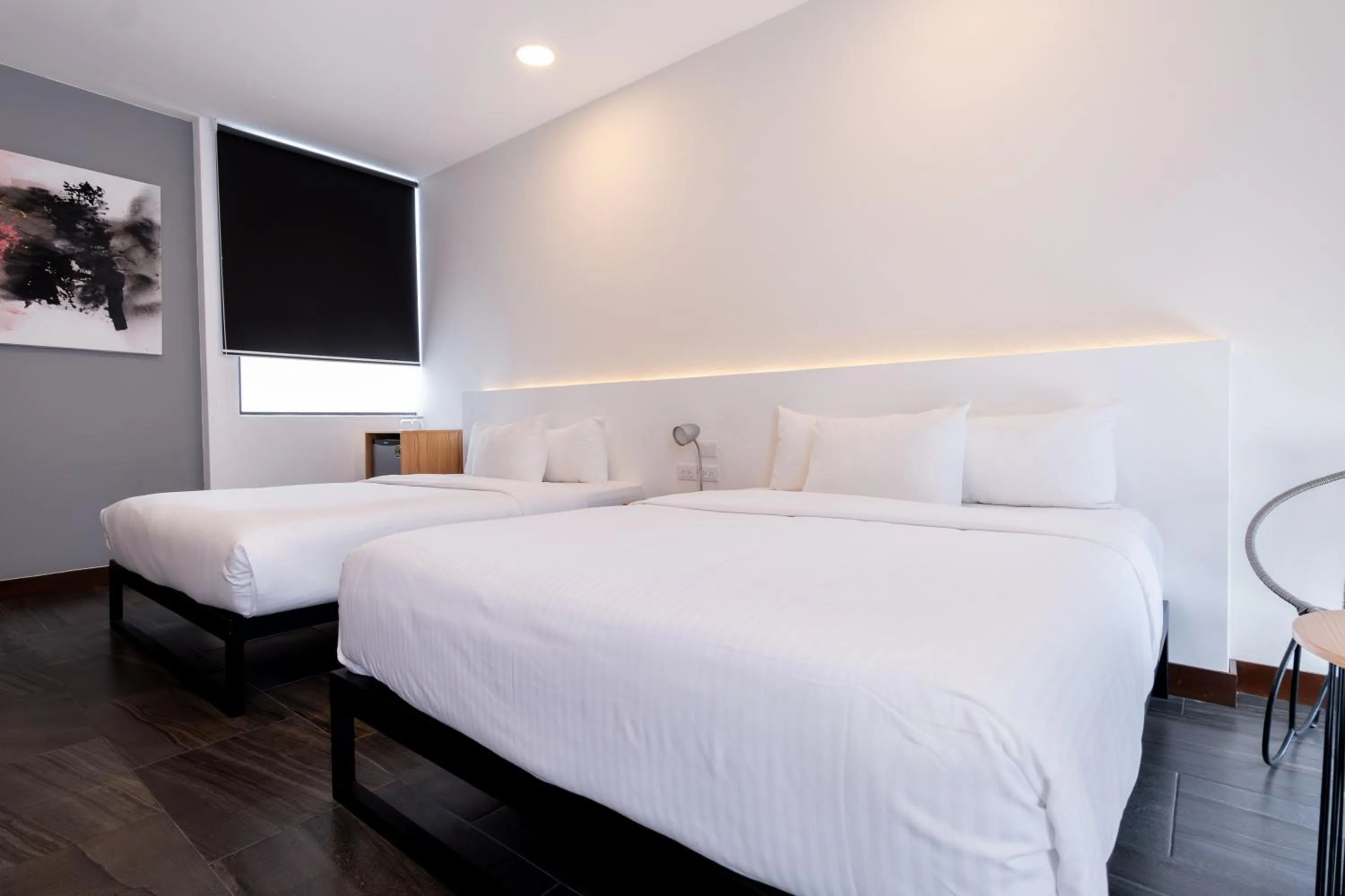 Bed in Urban Puebla by Grupo Amber