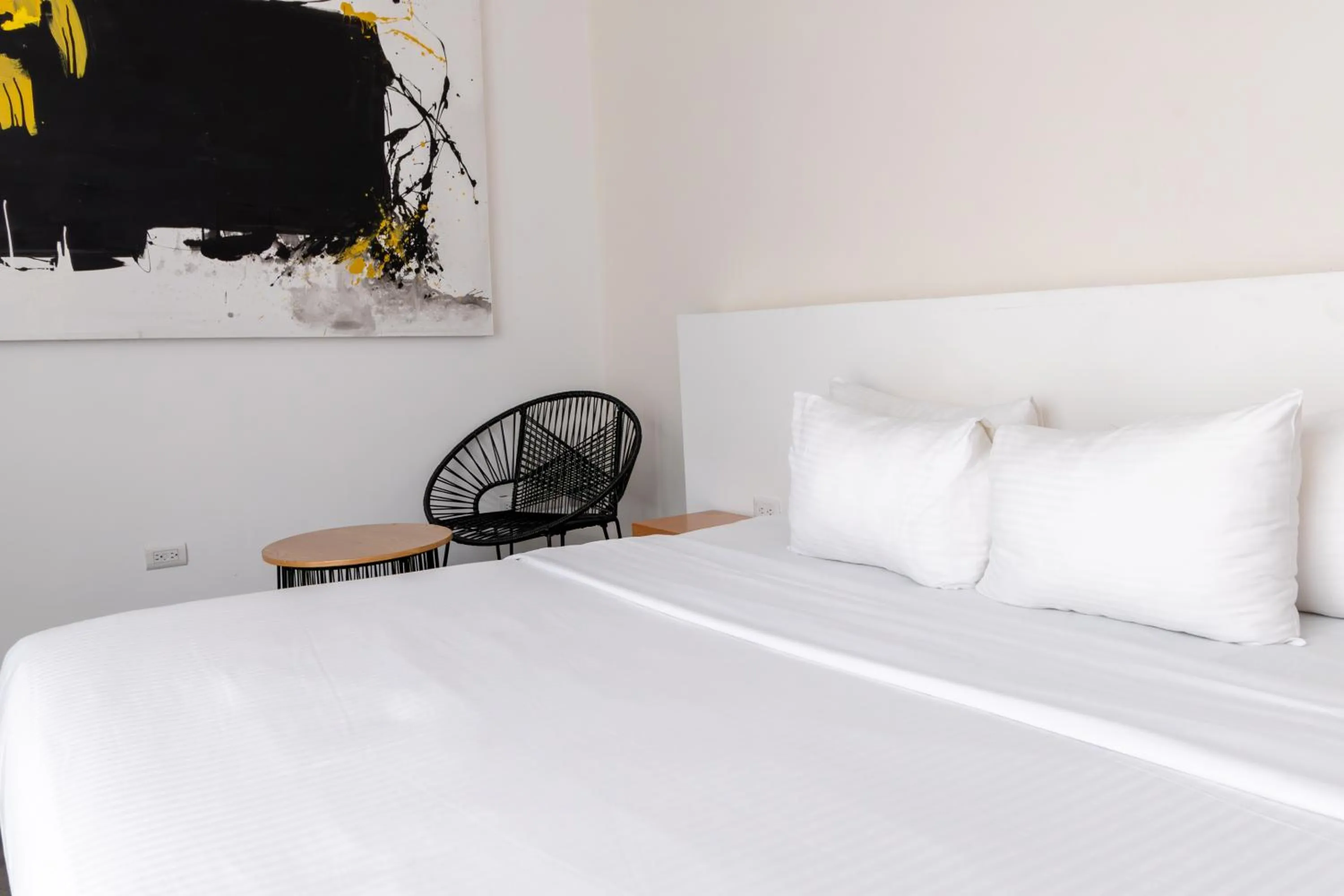 Bed in Urban Puebla by Grupo Amber