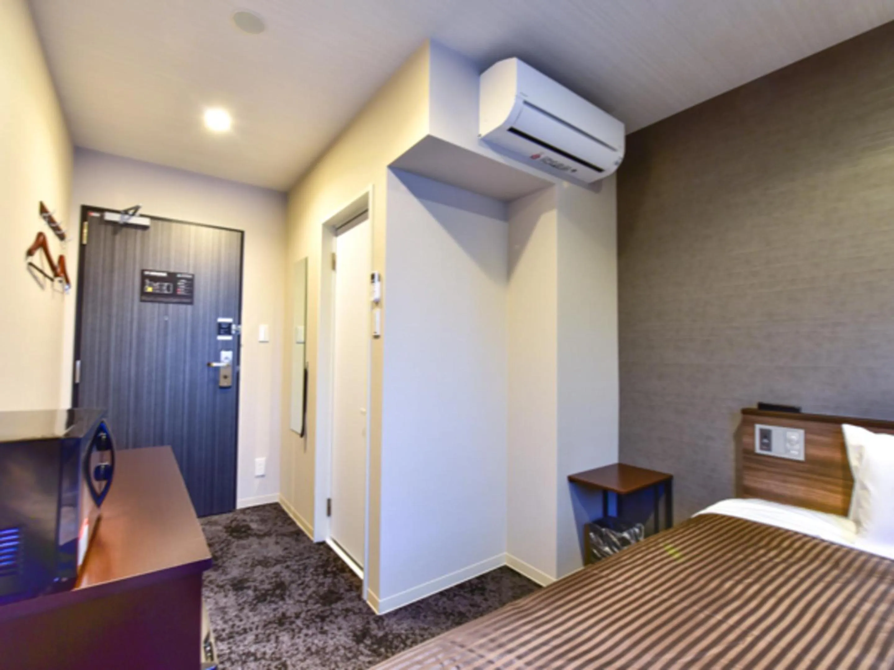 Bed in HOTEL LiVEMAX Fukuoka Tenjin West