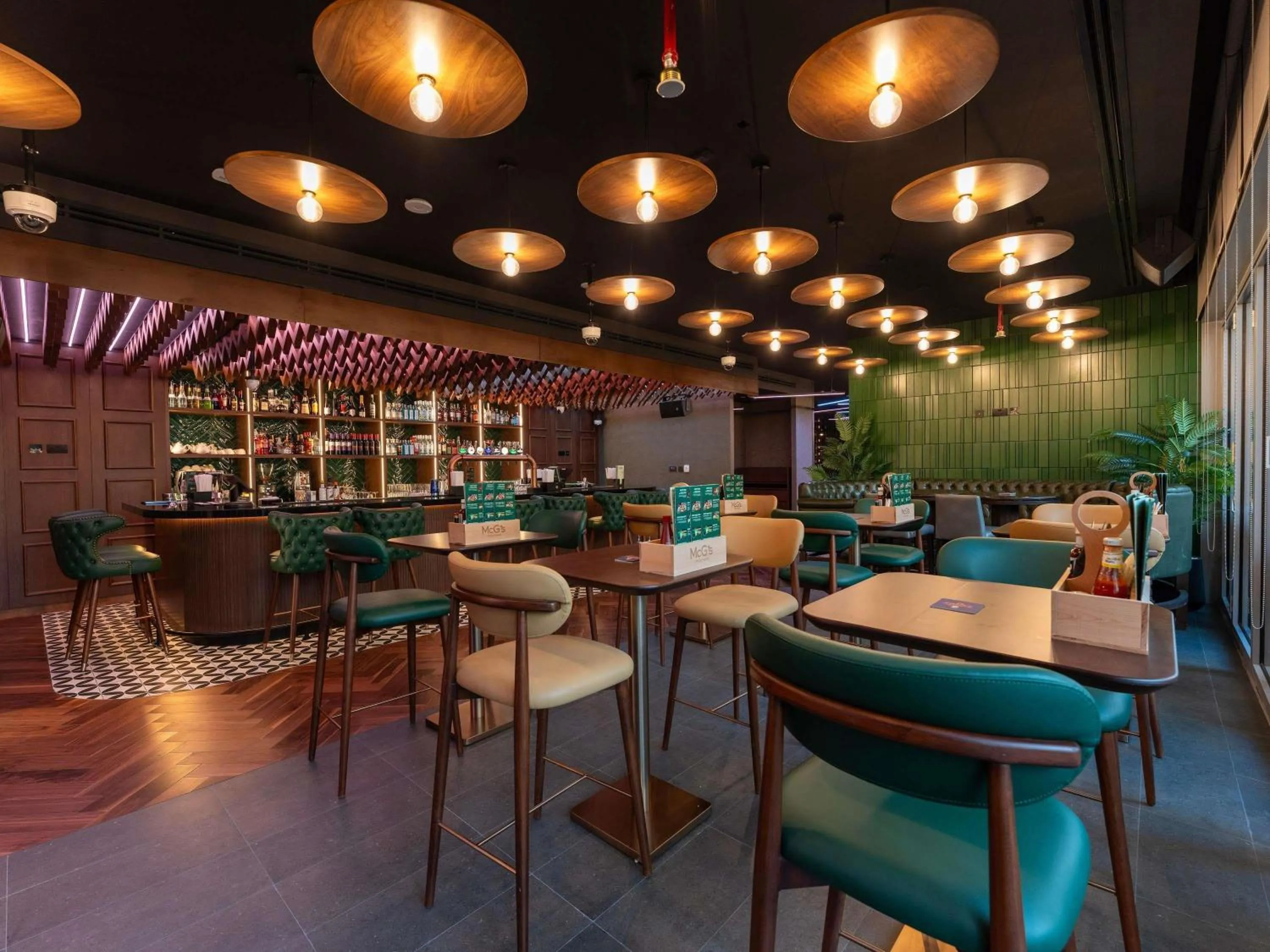 Lounge or bar in Novotel Dubai Gold District