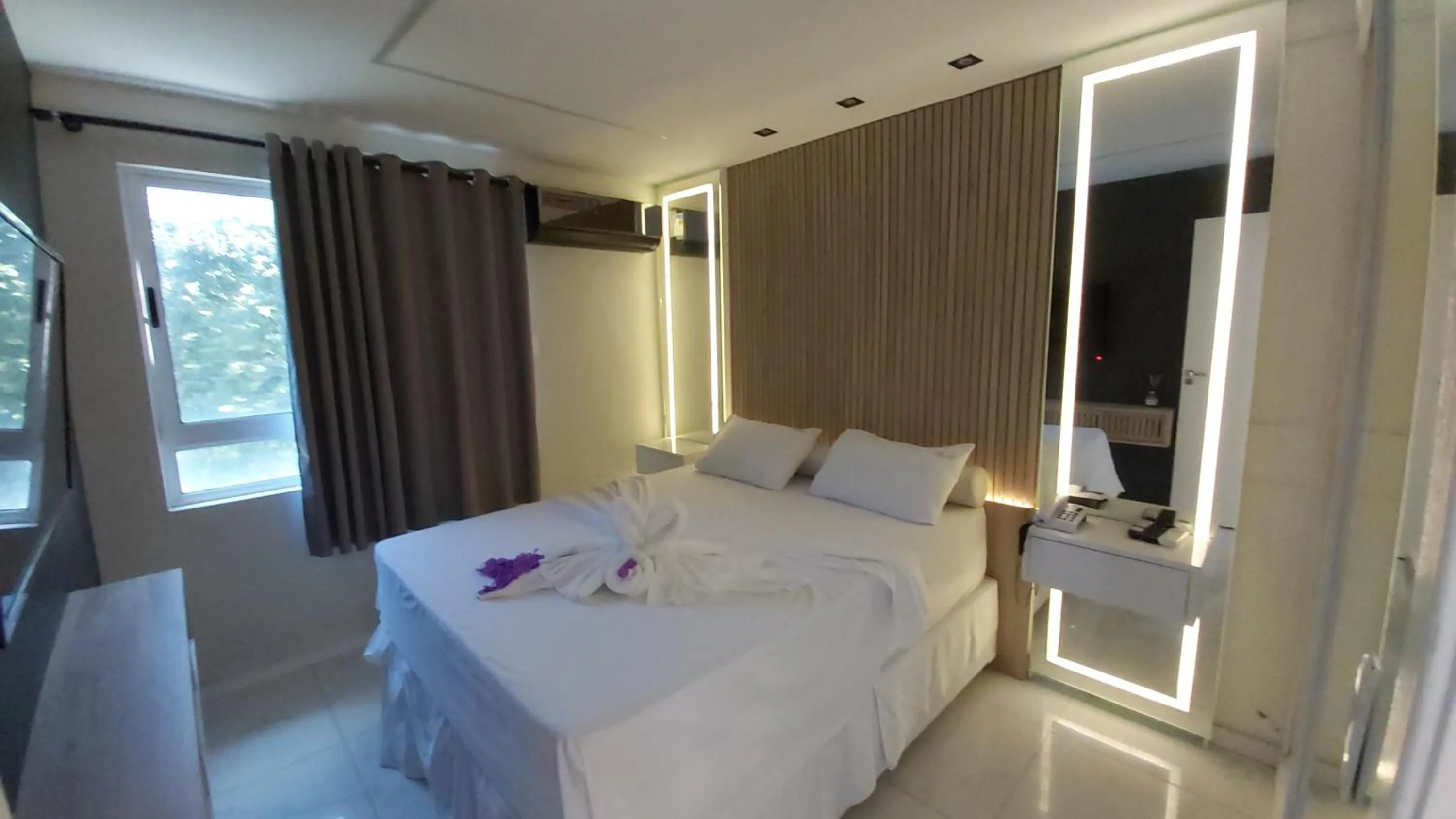 Photo of the whole room, Bed in Ponta Negra Beach Flat Prime