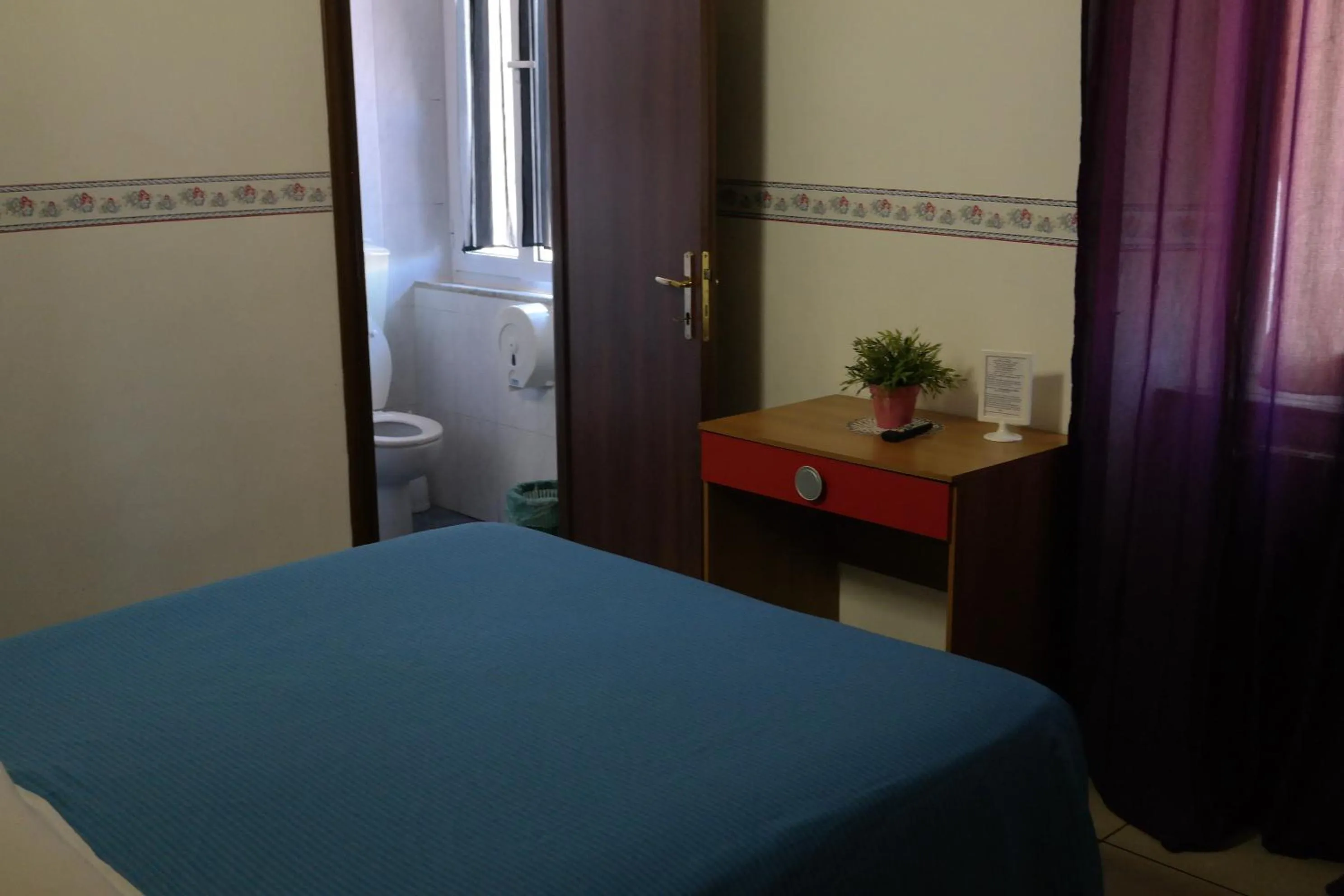 Photo of the whole room, Bed in Hotel Houston Livorno - Struttura Esclusivamente Turistica - Not for Business or Workers