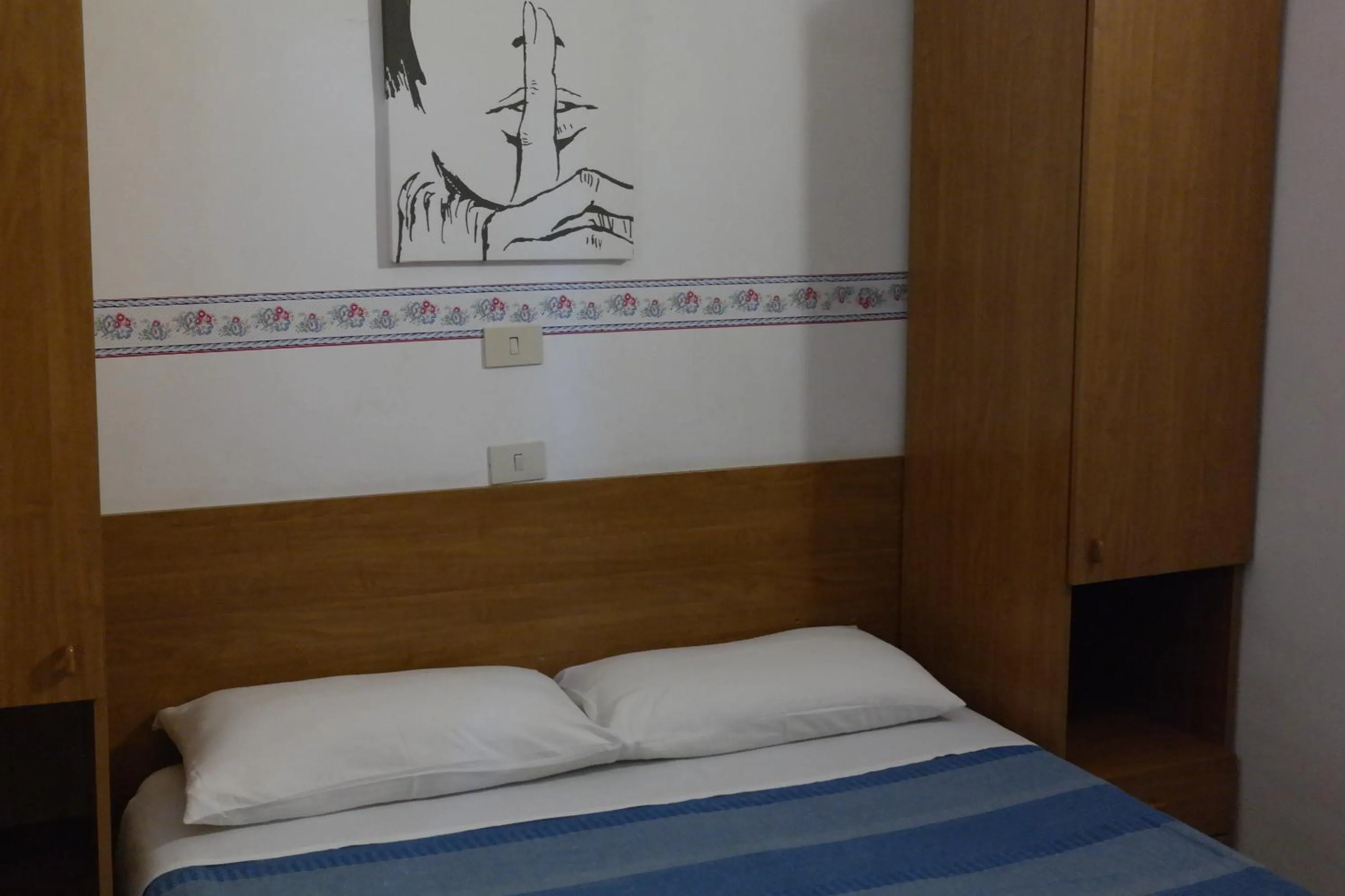 Photo of the whole room, Bed in Hotel Houston Livorno - Struttura Esclusivamente Turistica - Not for Business or Workers