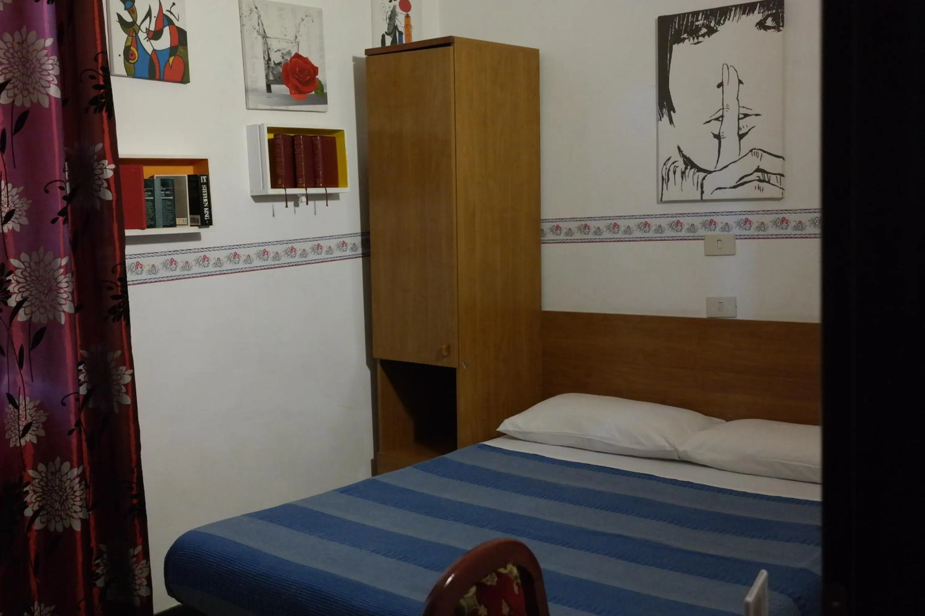 Photo of the whole room, Bed in Hotel Houston Livorno - Struttura Esclusivamente Turistica - Not for Business or Workers