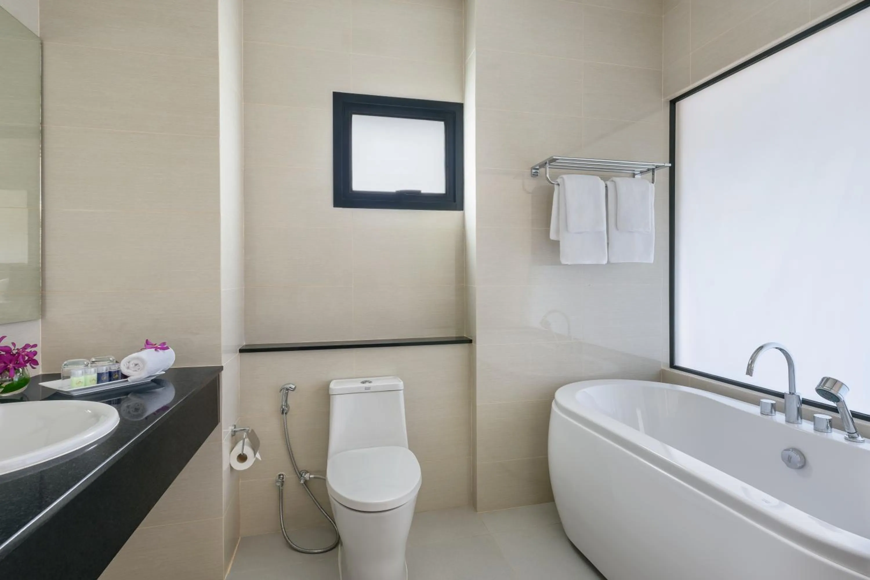 Bathroom in Chainarai Riverside - SHA Plus Certified