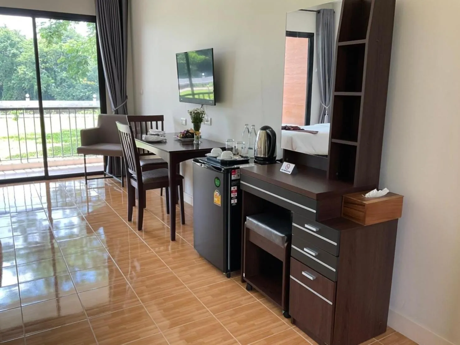 Living room in Chainarai Riverside - SHA Plus Certified