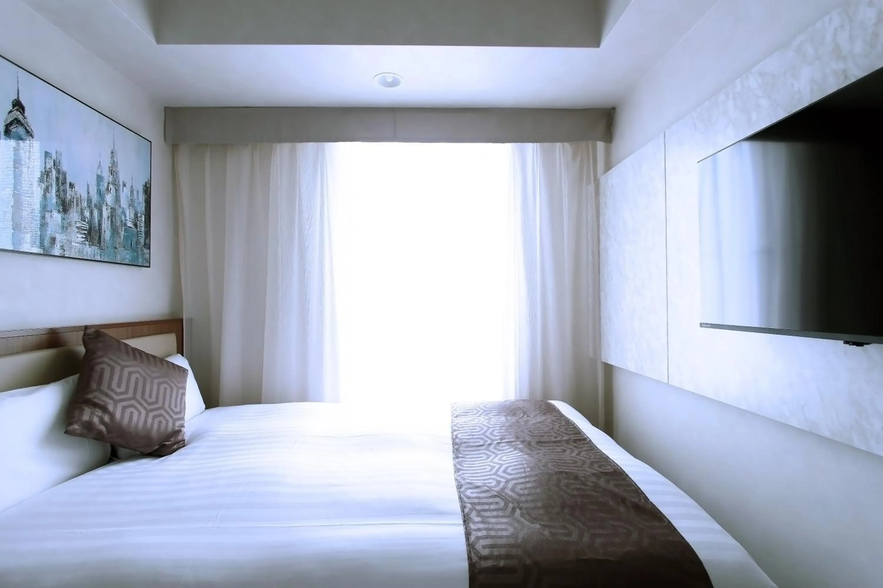 Photo of the whole room, Bed in KOKO HOTEL Ginza-1chome