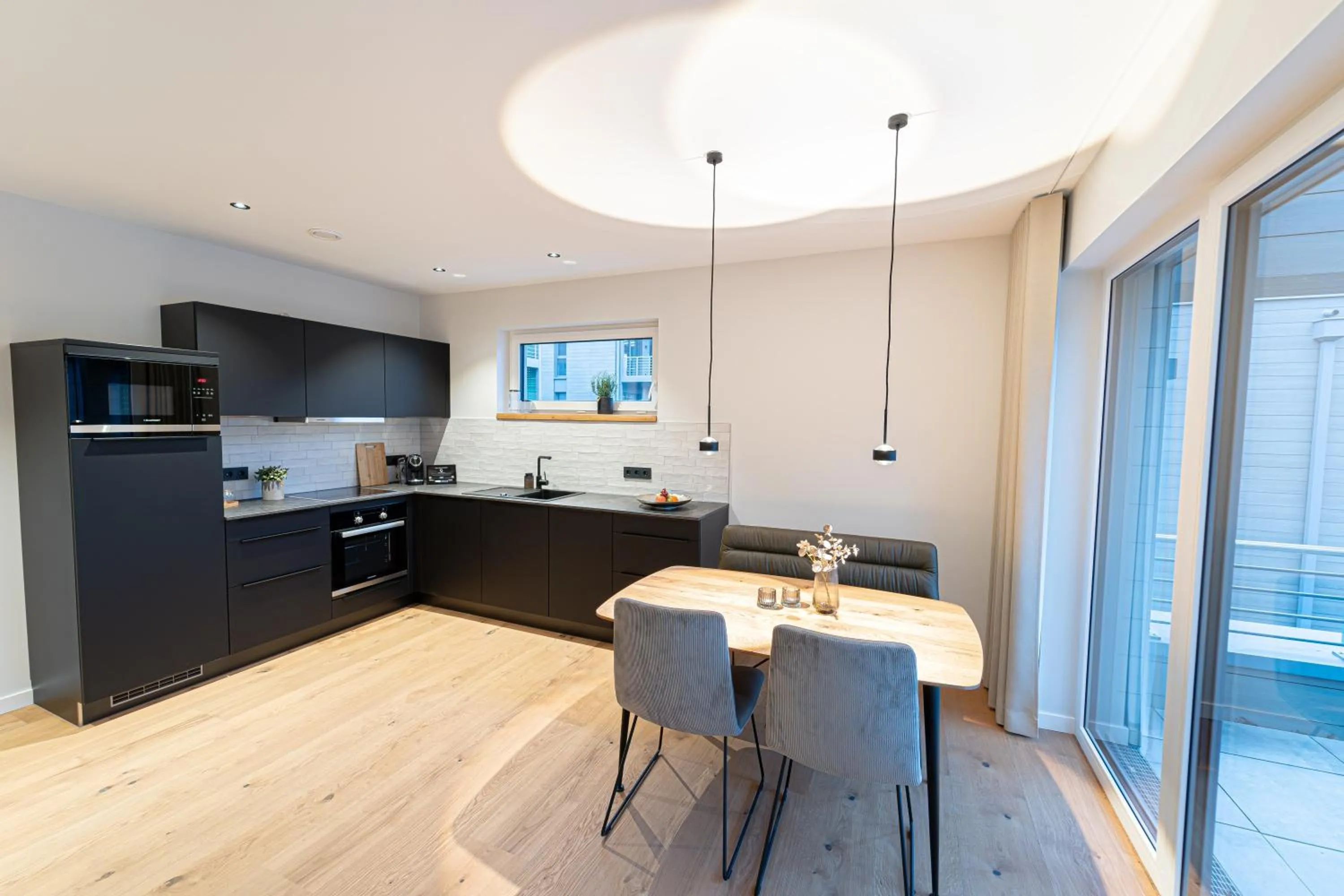 Kitchen or kitchenette in See und Sporthotel Ankum mit Lakeside Apartments