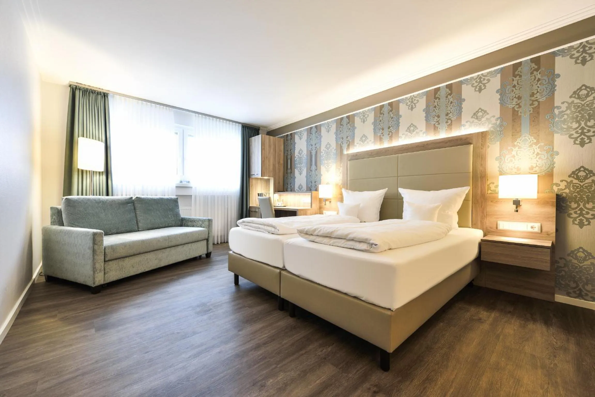 Photo of the whole room, Bed in See und Sporthotel Ankum mit Lakeside Apartments