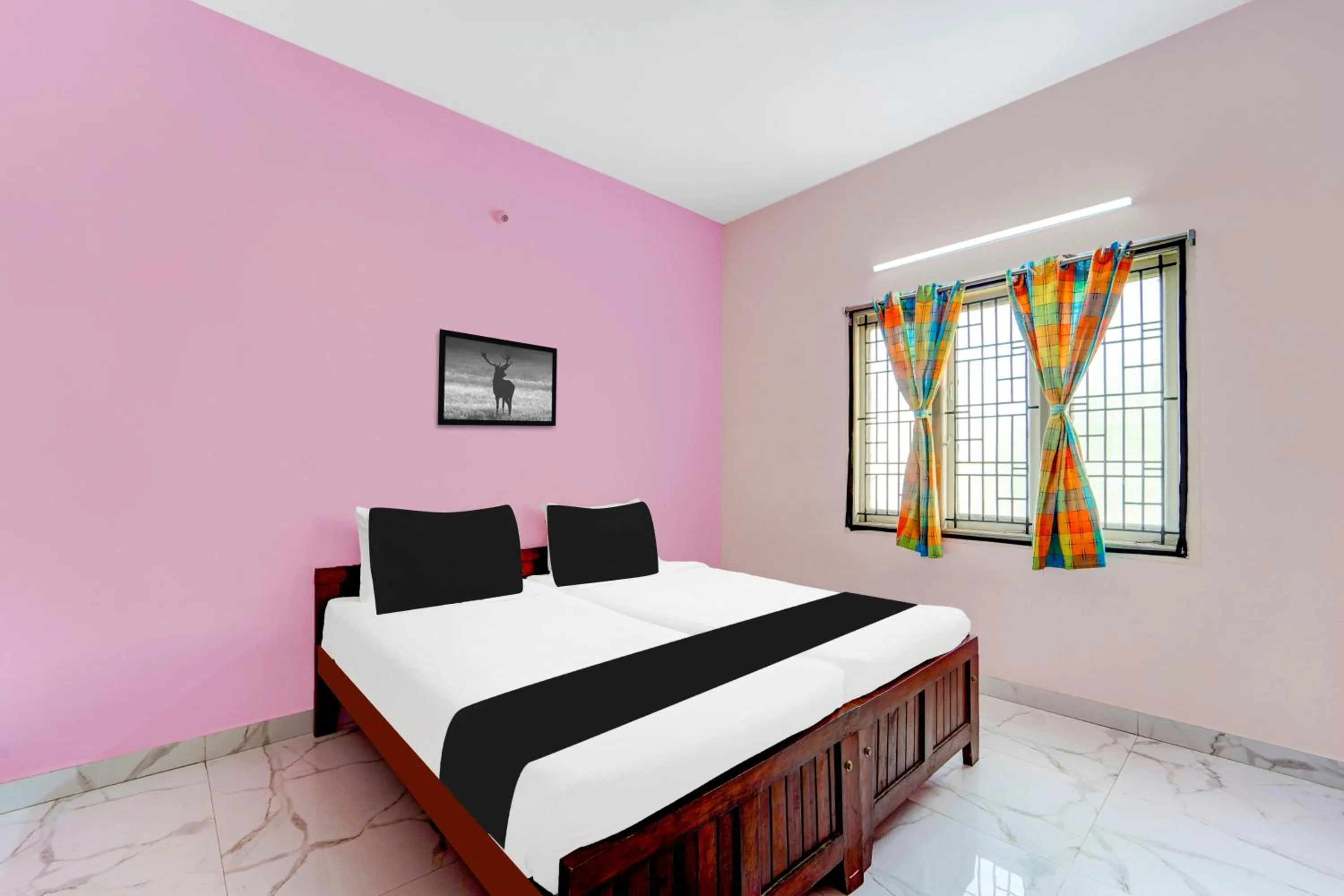 Bedroom in Super Hotel O Madurai Near Bus Stand