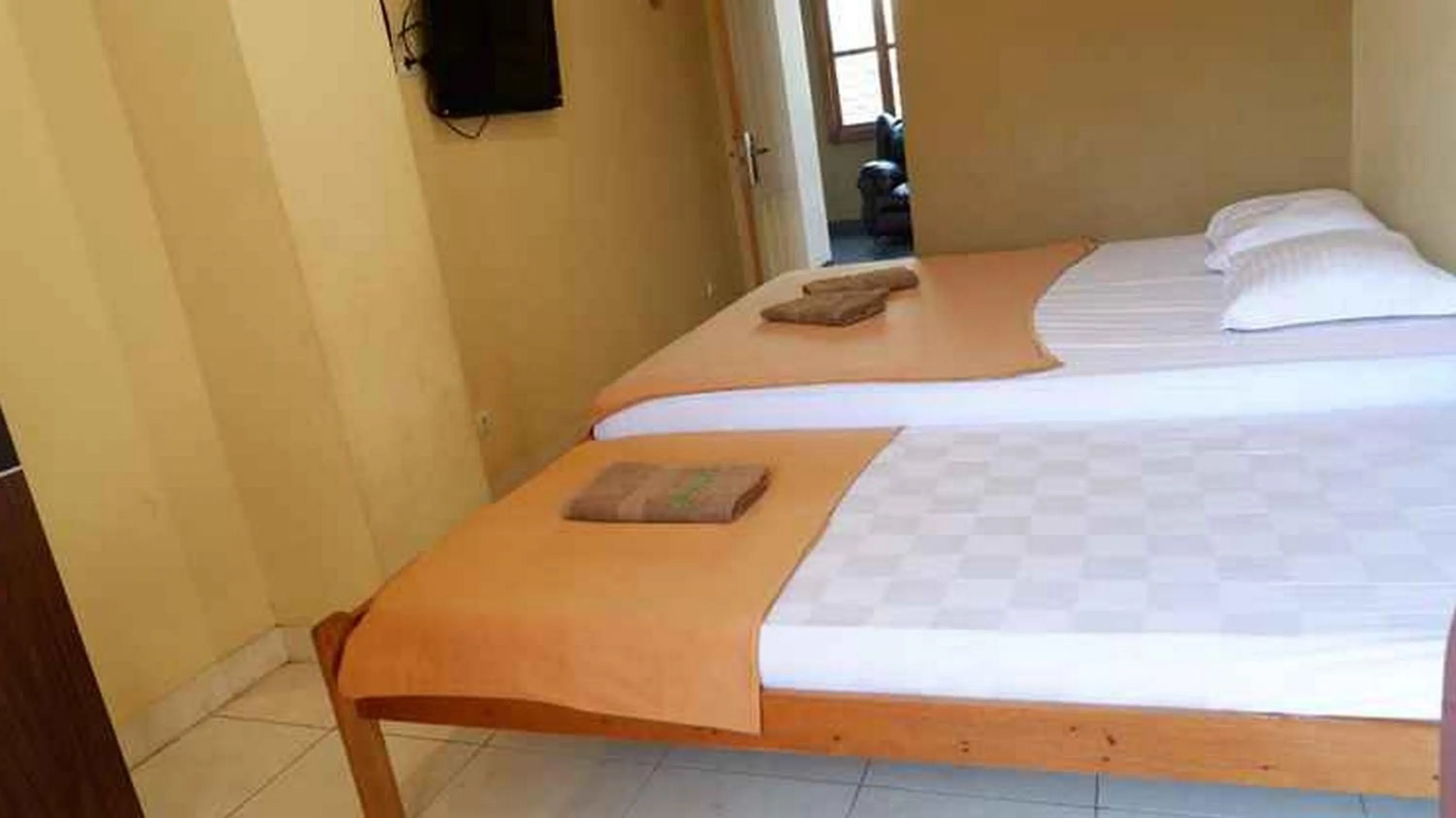 Bed in RedDoorz near Jogja City Mall 4