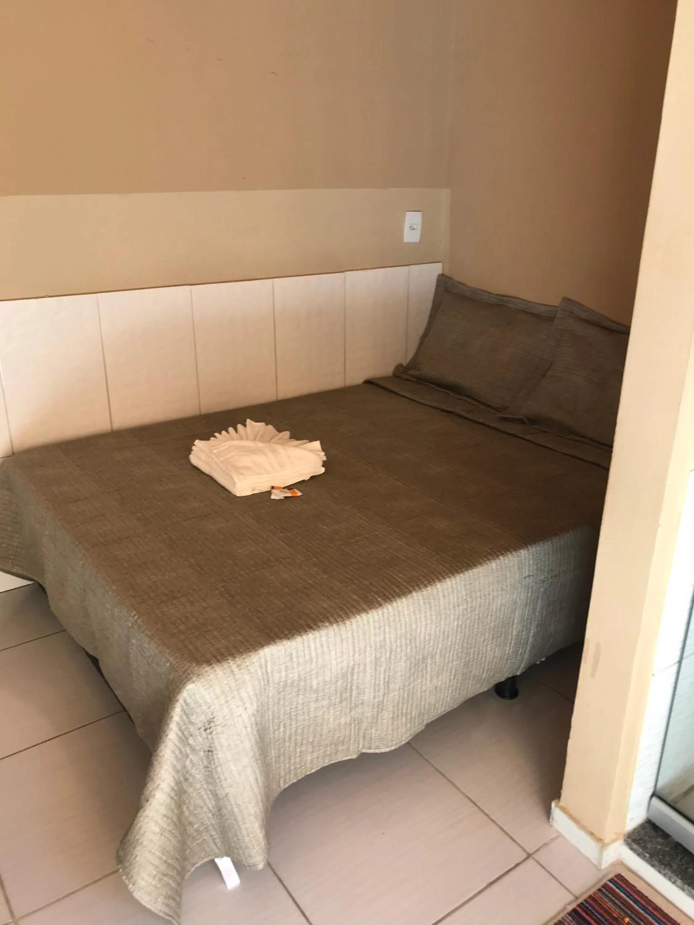 Bed in Pousada Floripes