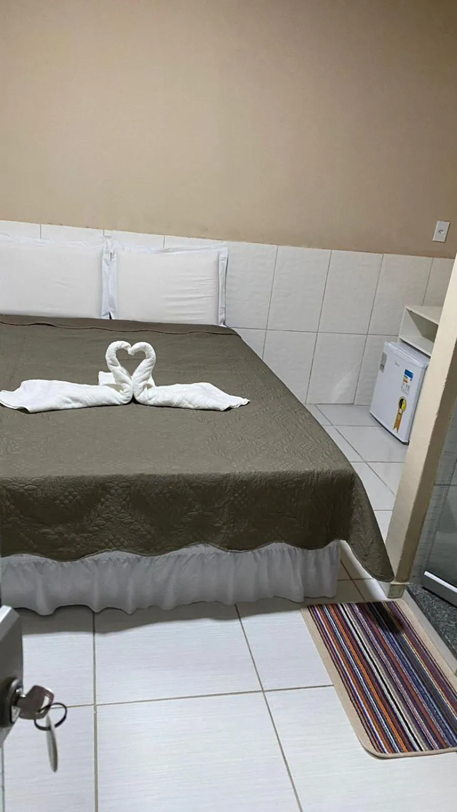 Bed in Pousada Floripes