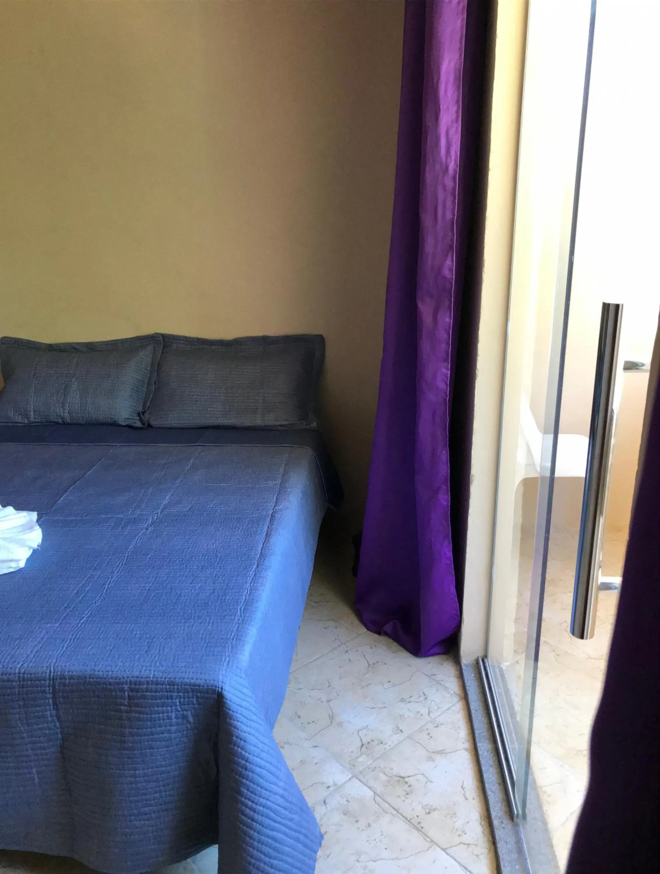 Bed in Pousada Floripes