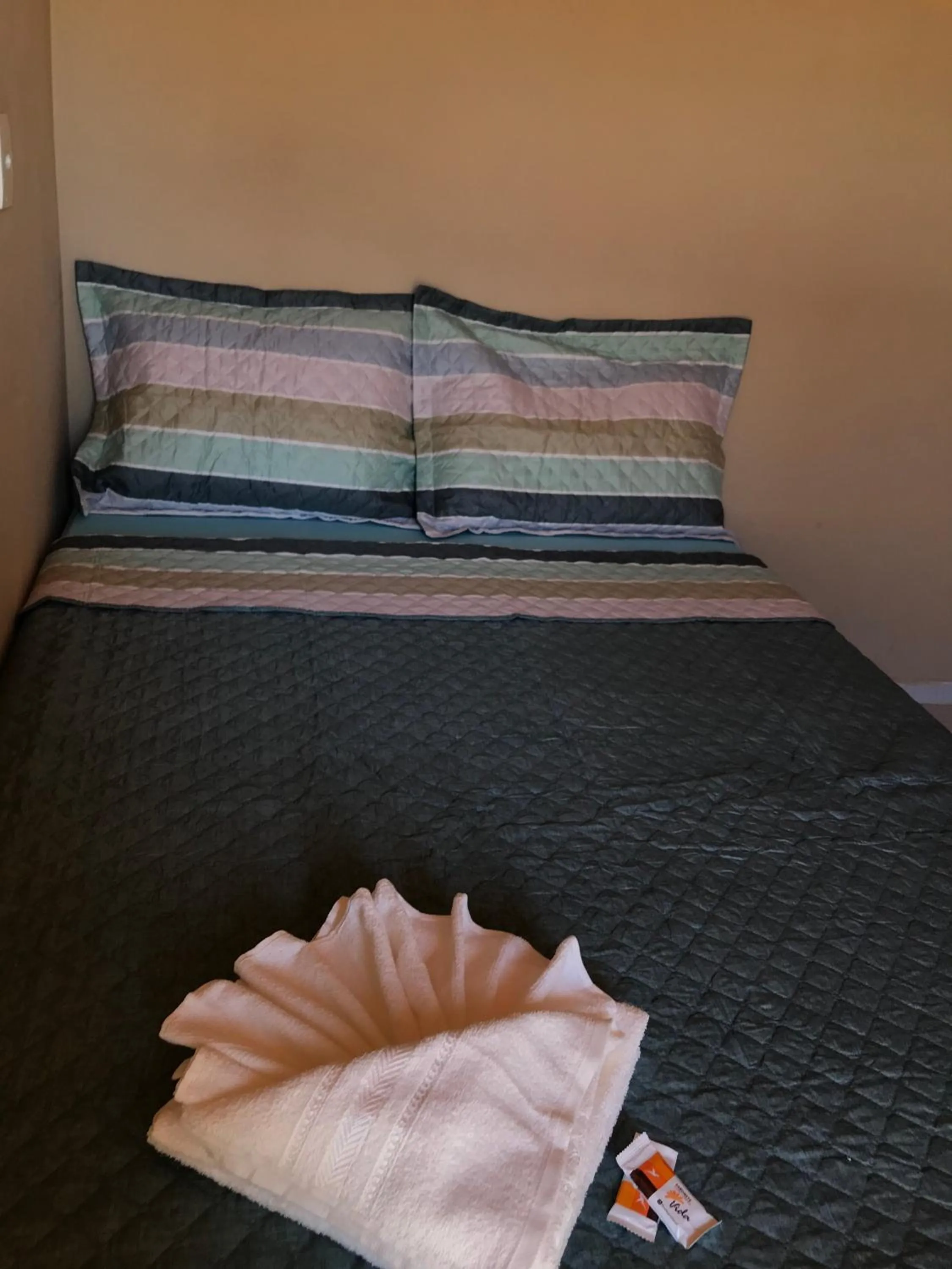 Bed in Pousada Floripes